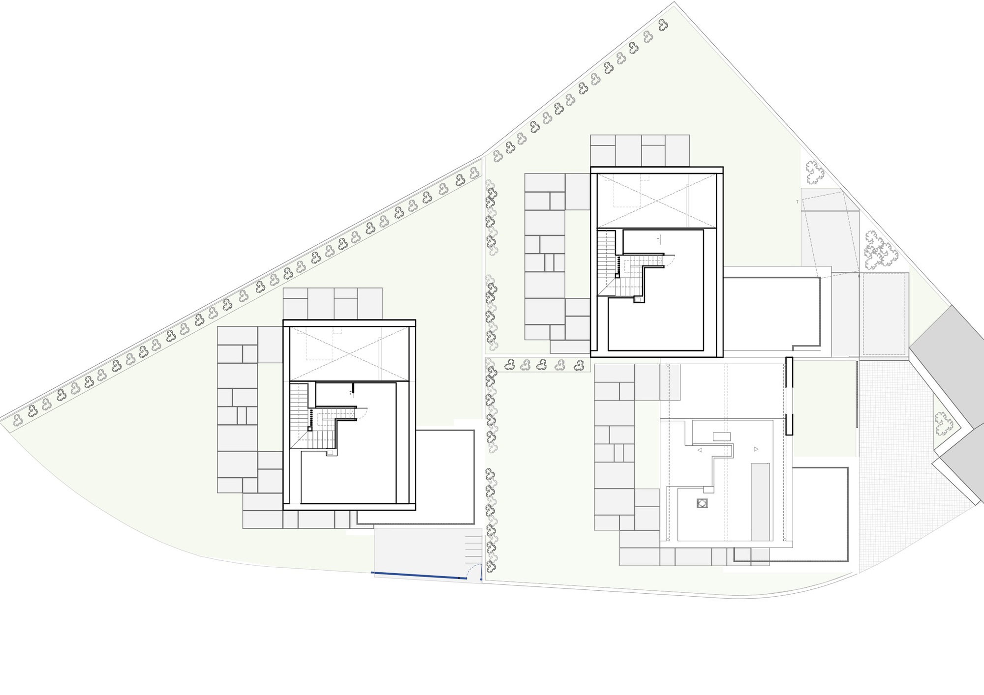 Site plan drawing showing two residential buildings with central access road and tree symbols