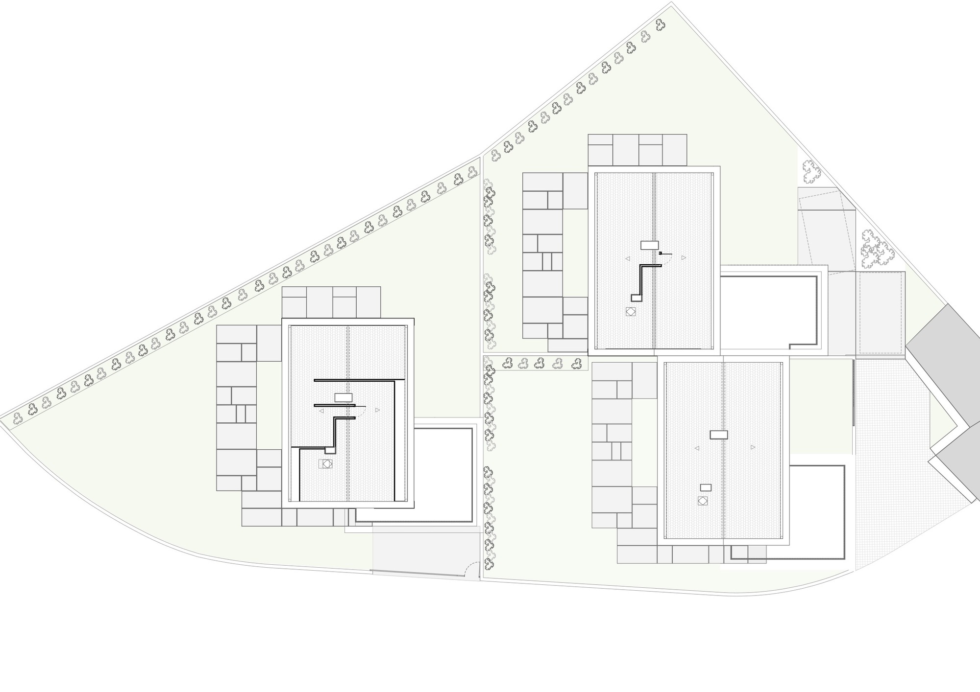Floor plan drawing showing upper level layouts with bedrooms and staircases in two buildings