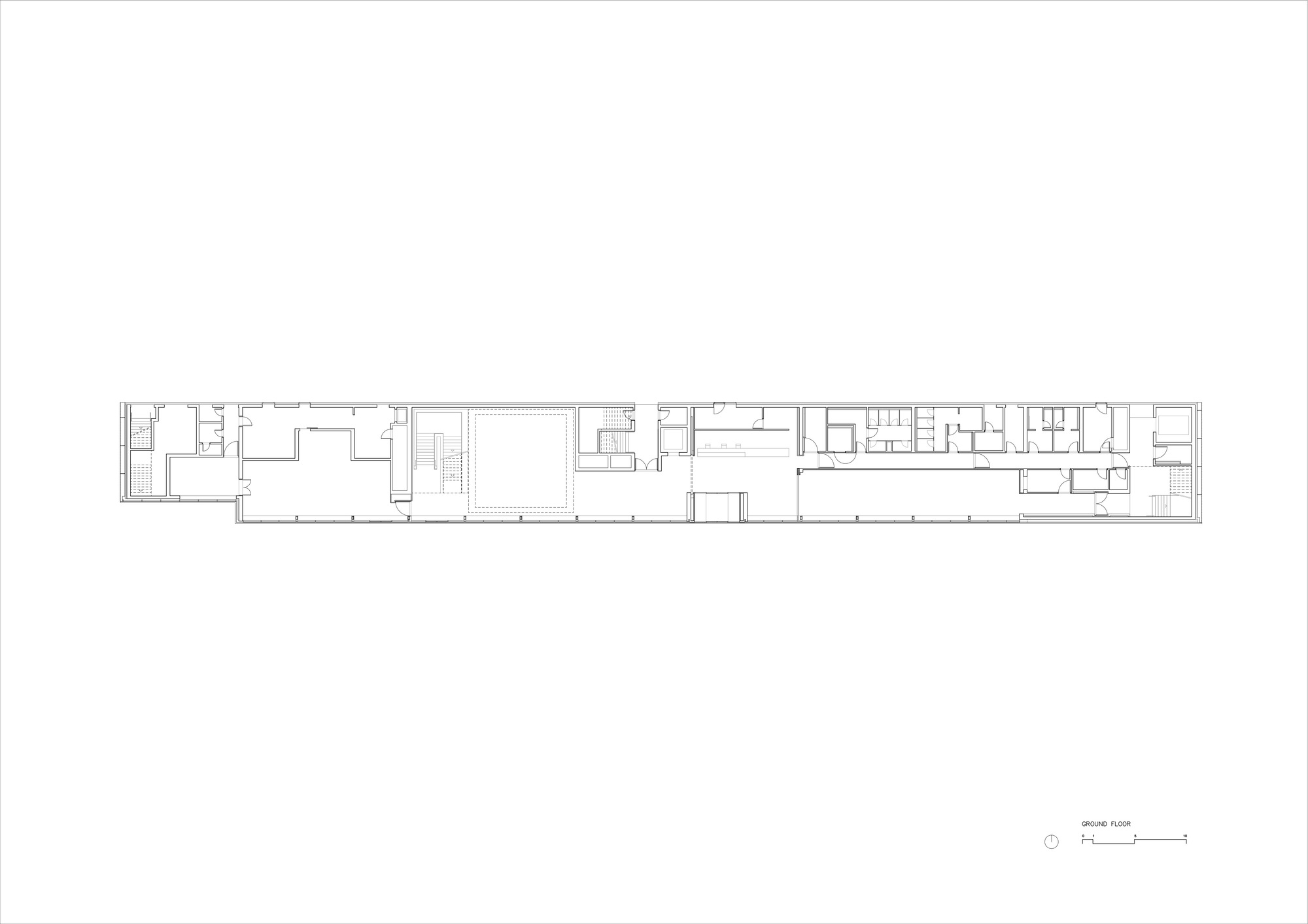Ground floor plan drawing showing elongated rectangular layout with rooms along both sides