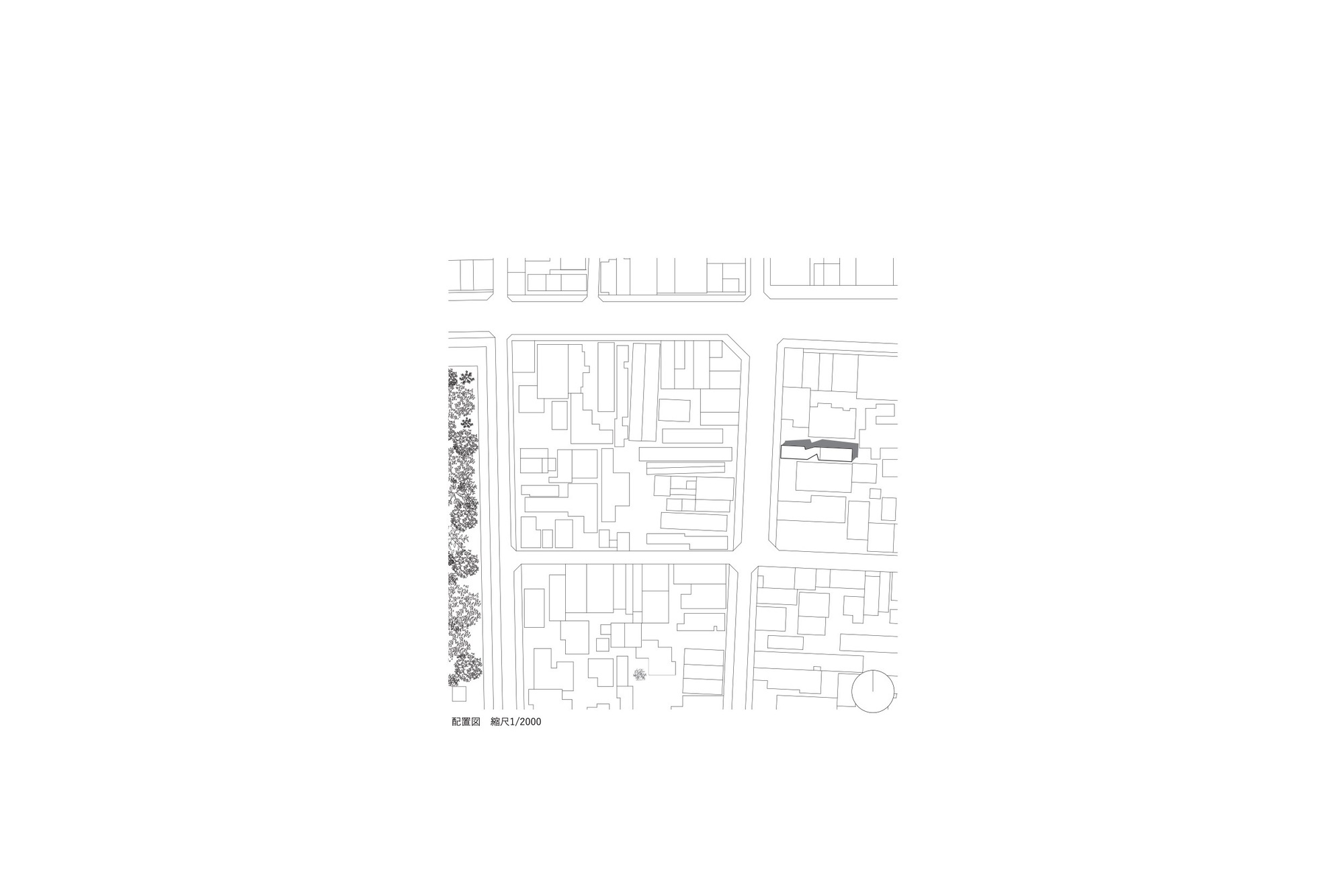 Site plan drawing showing the building footprint within a dense urban block with tree-lined street