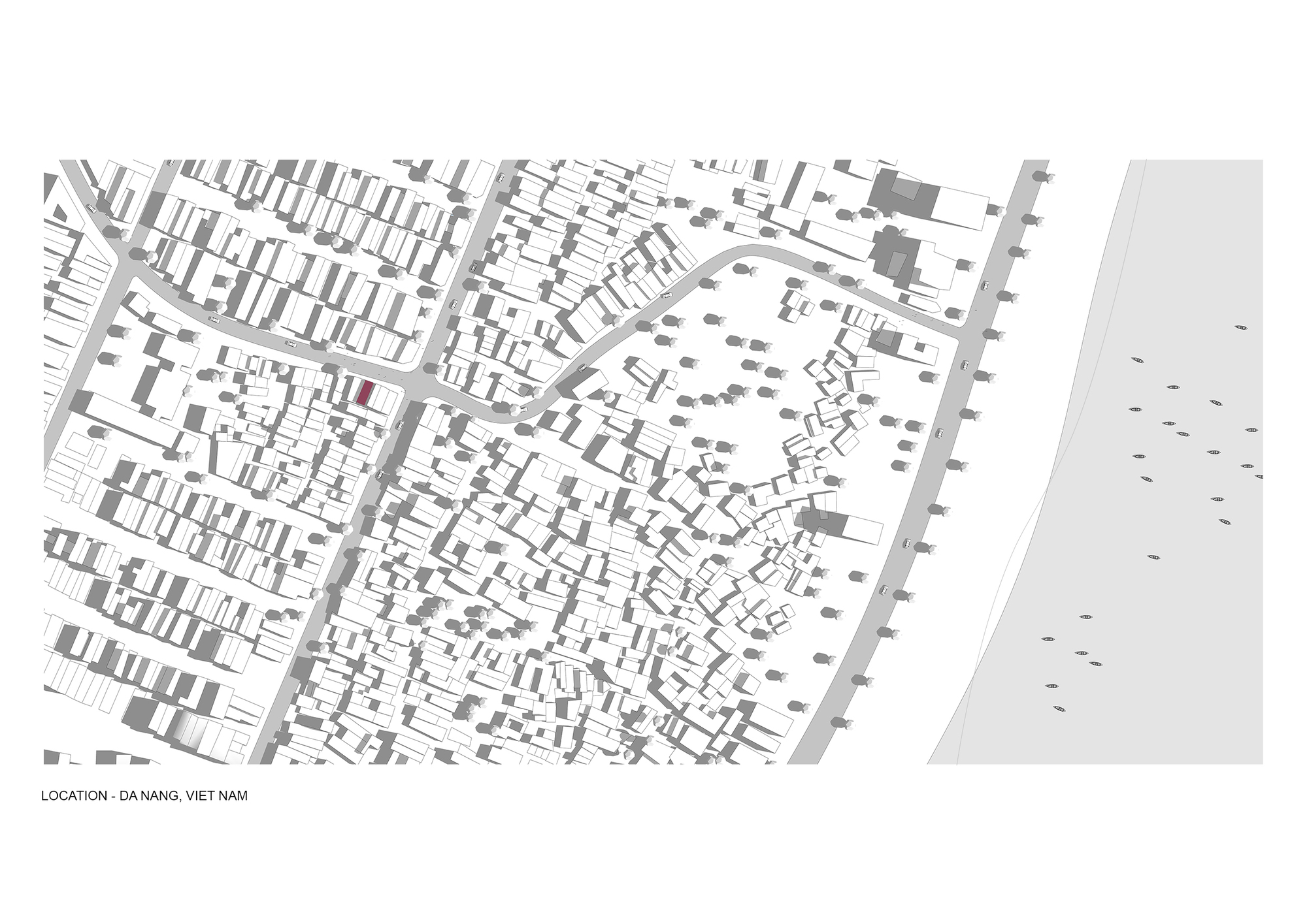 Site plan drawing showing dense urban fabric bordered by a waterfront promenade with scattered trees