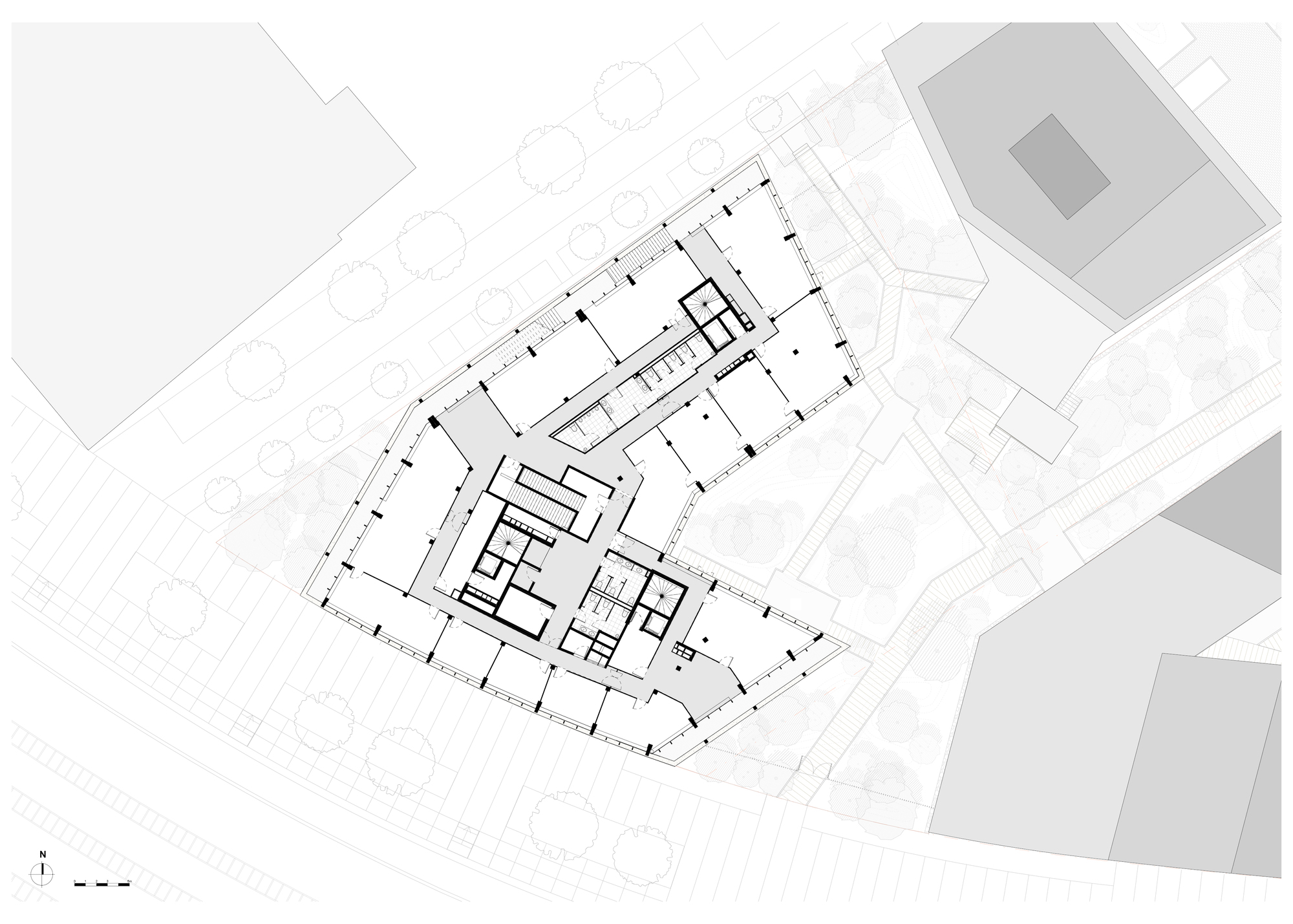 Floor plan drawing illustrating an angled perimeter with interior rooms clustered around a central core