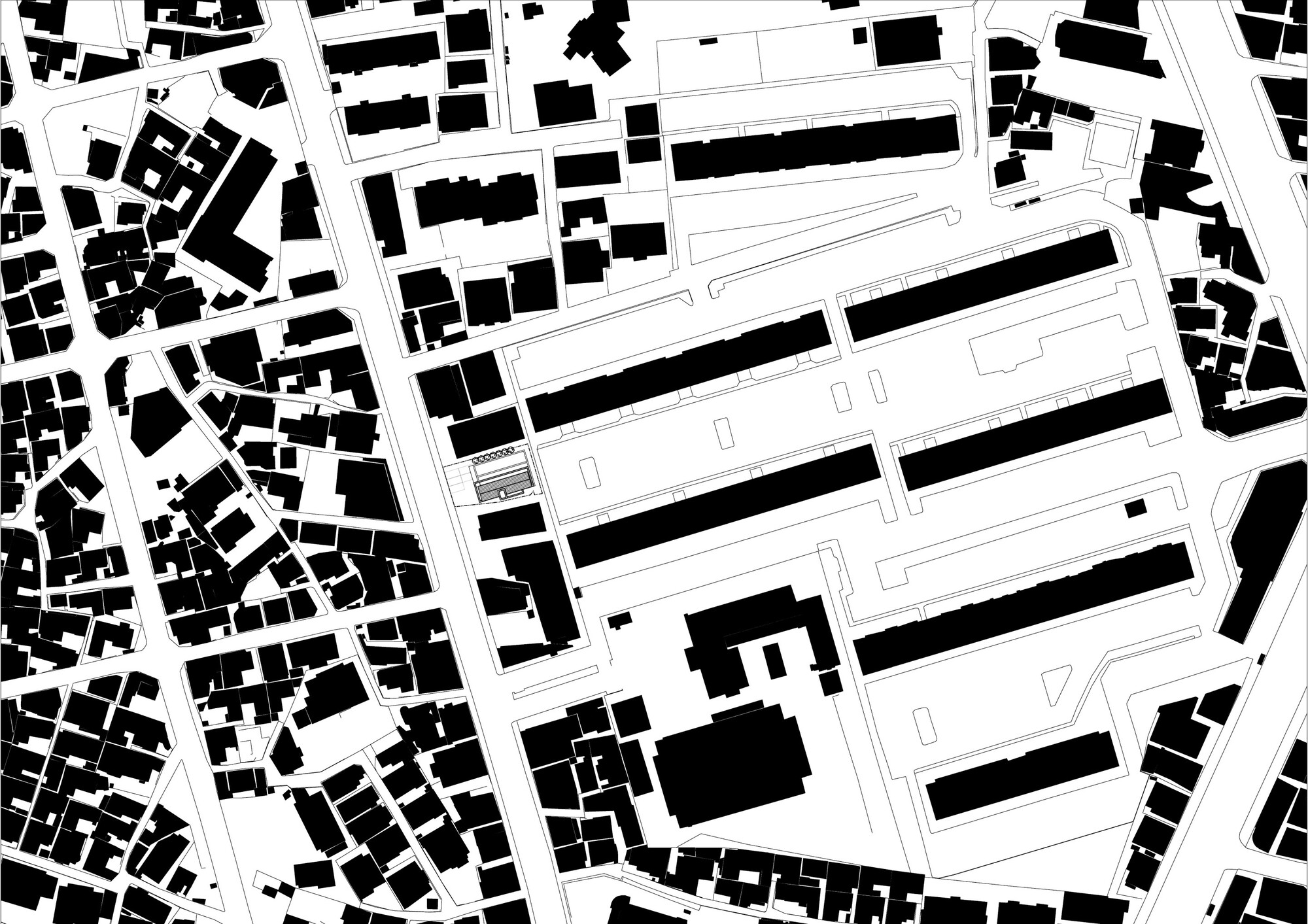 Site plan drawing showing the building footprint within the surrounding urban fabric and street grid