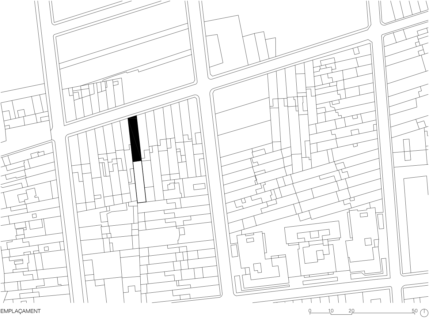 Site plan drawing showing a single filled footprint among surrounding urban blocks and street grid