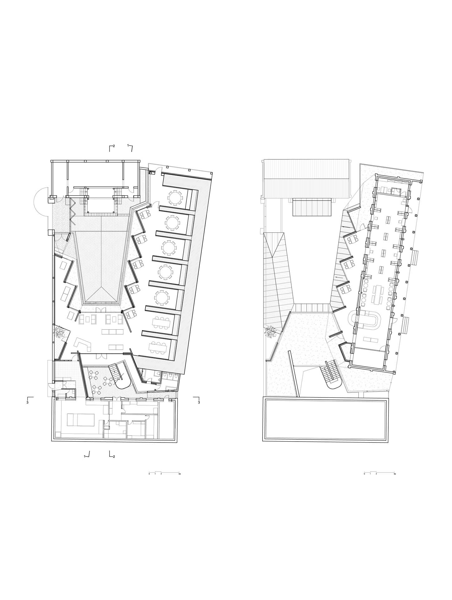 Floor plan drawings showing two levels of a building with angled volumes and central voids