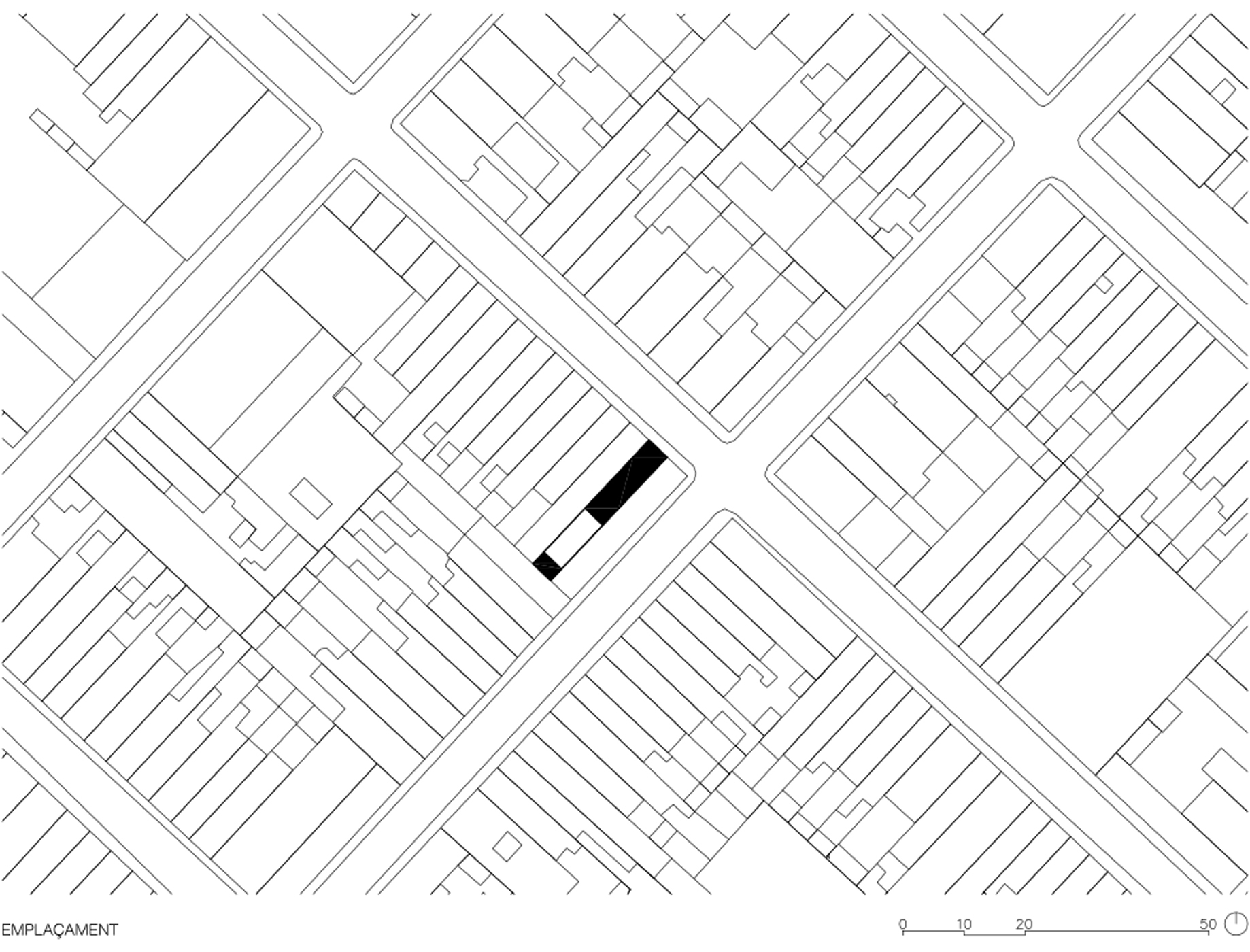Site plan drawing showing the building footprint within surrounding urban street grid