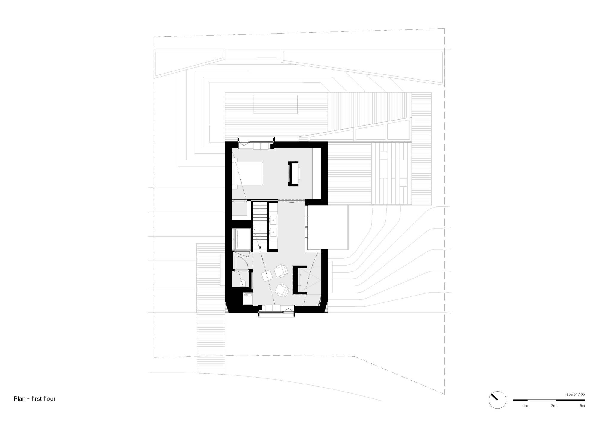 First floor plan drawing showing central stair with three rooms arranged around it