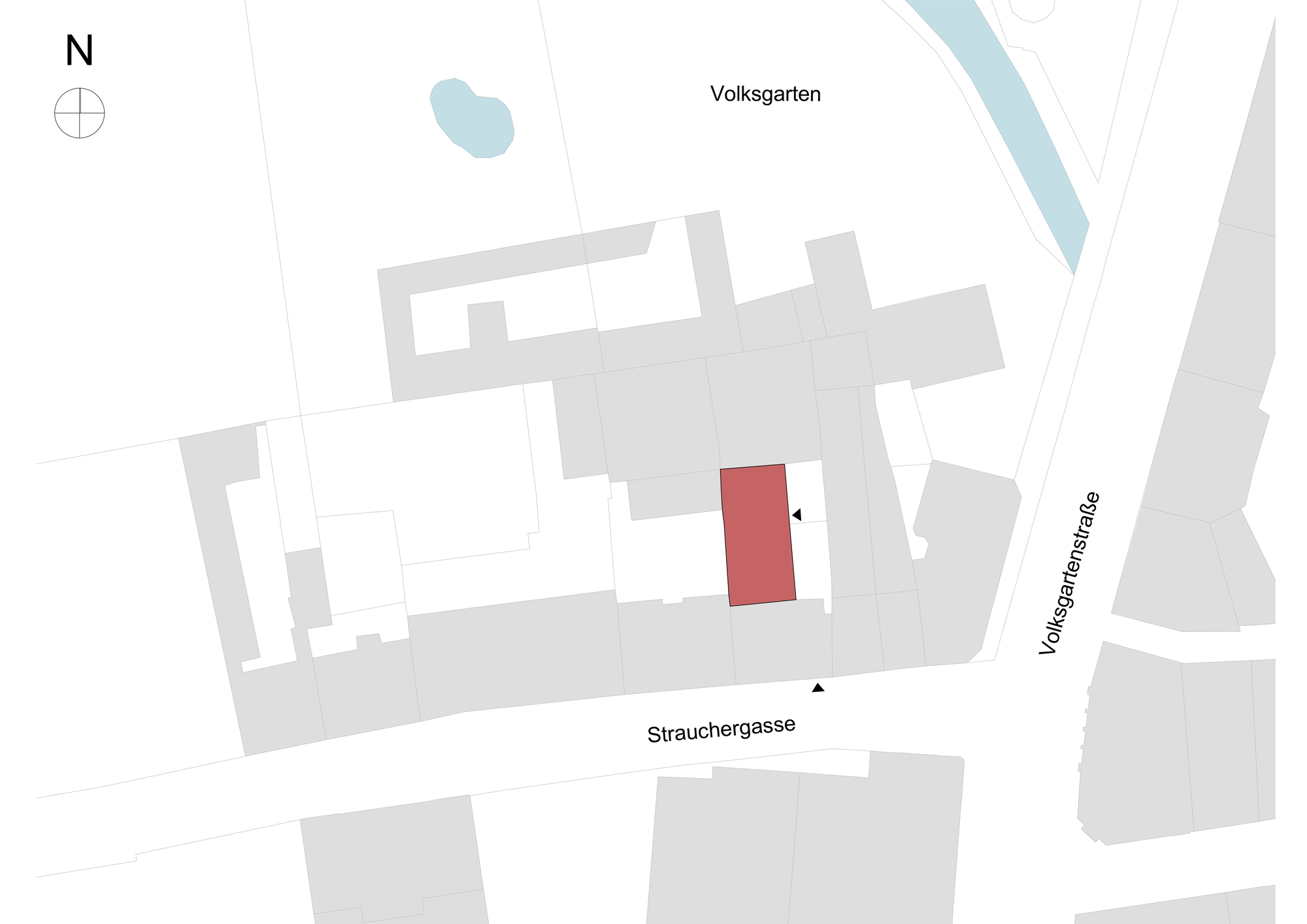 Site plan highlighting a red rectangular building footprint among surrounding grey volumes