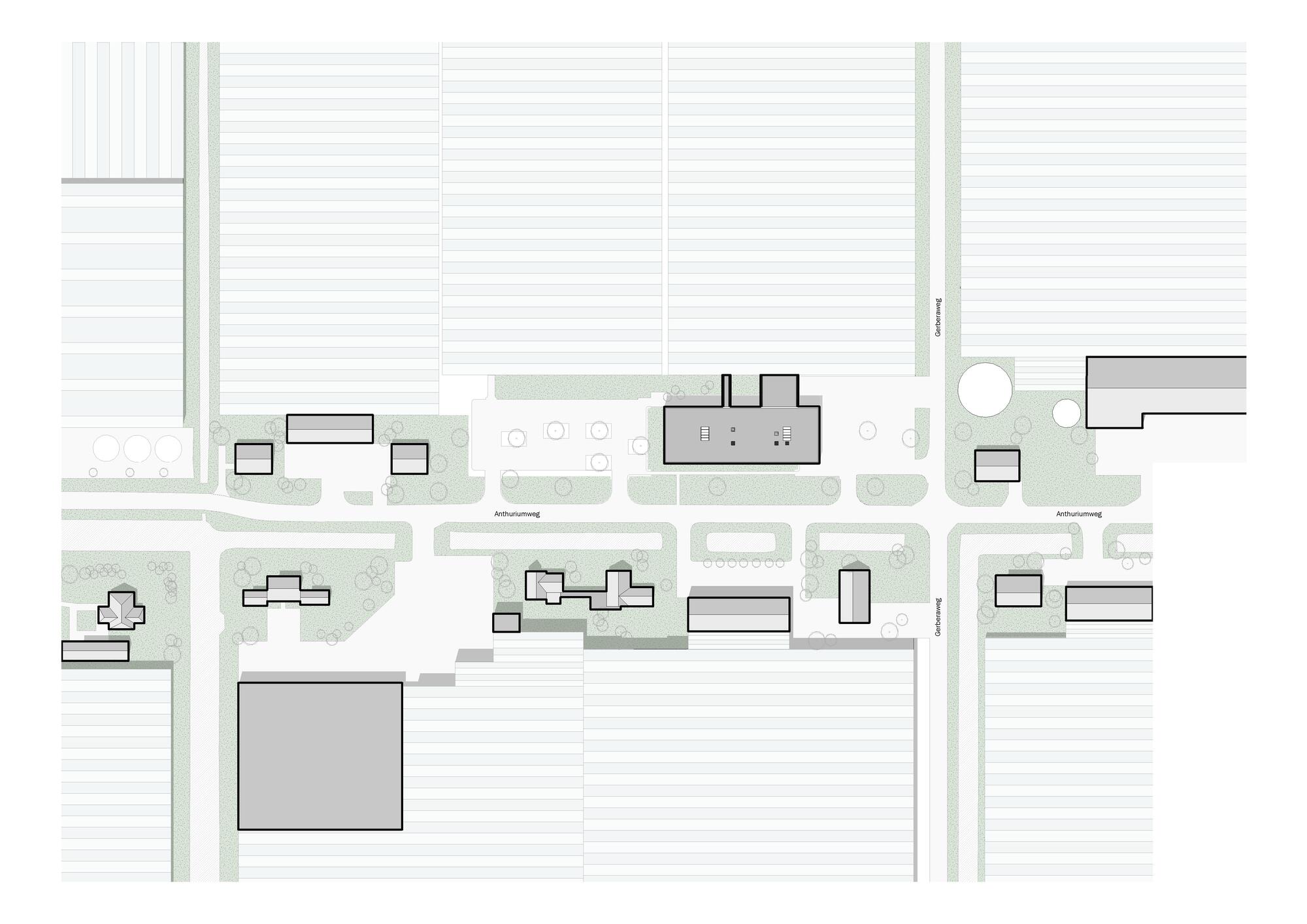 Site plan drawing showing building footprints and landscaped areas within surrounding street grid