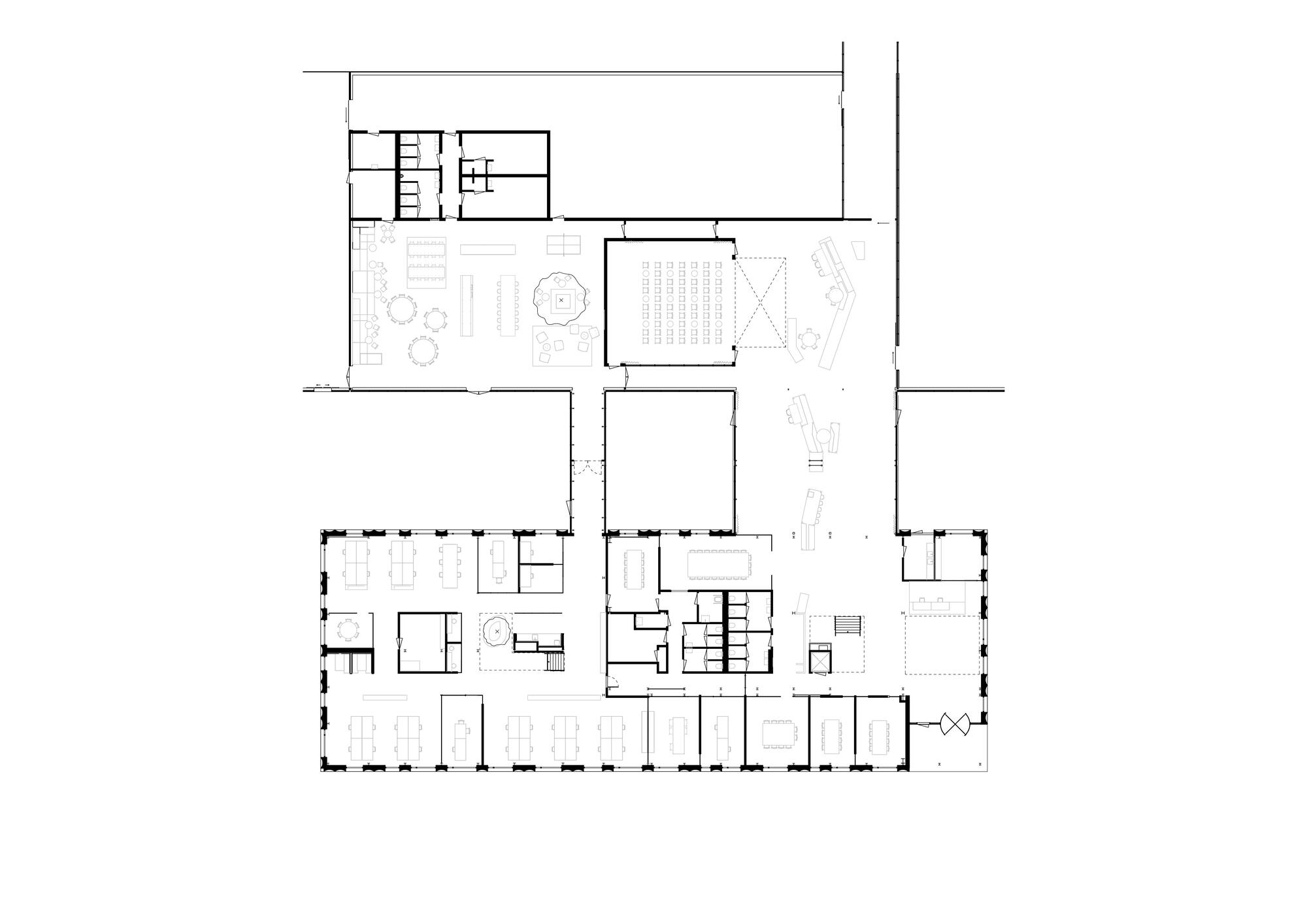 Floor plan drawing showing office layout with central courtyard and perimeter workspaces