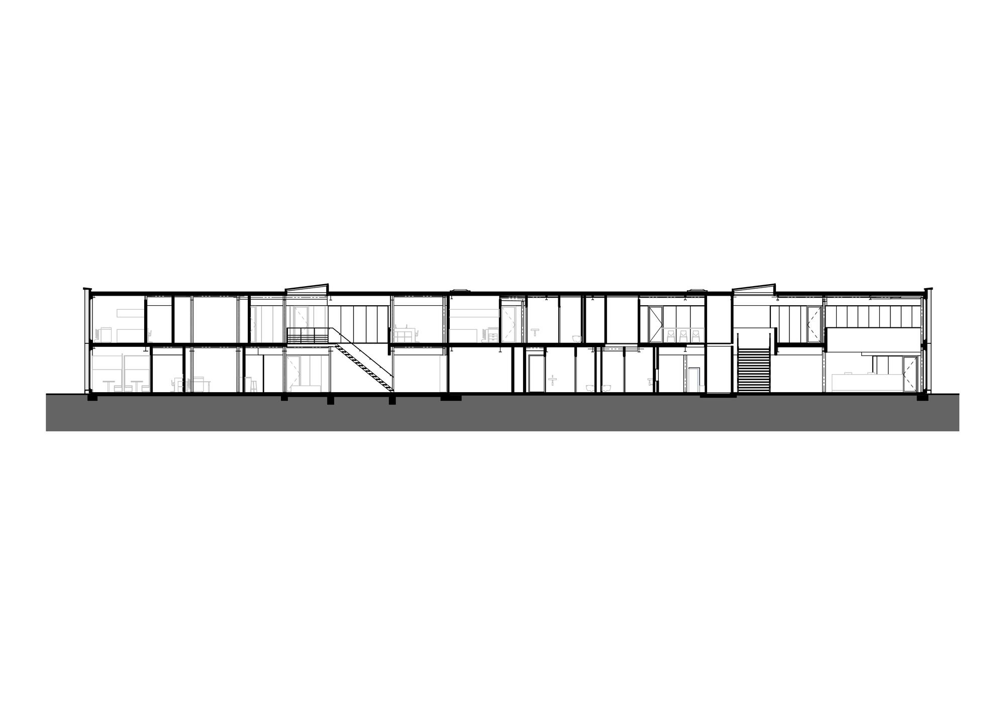 Section drawing showing a two-story structure with multiple interior staircases and room divisions