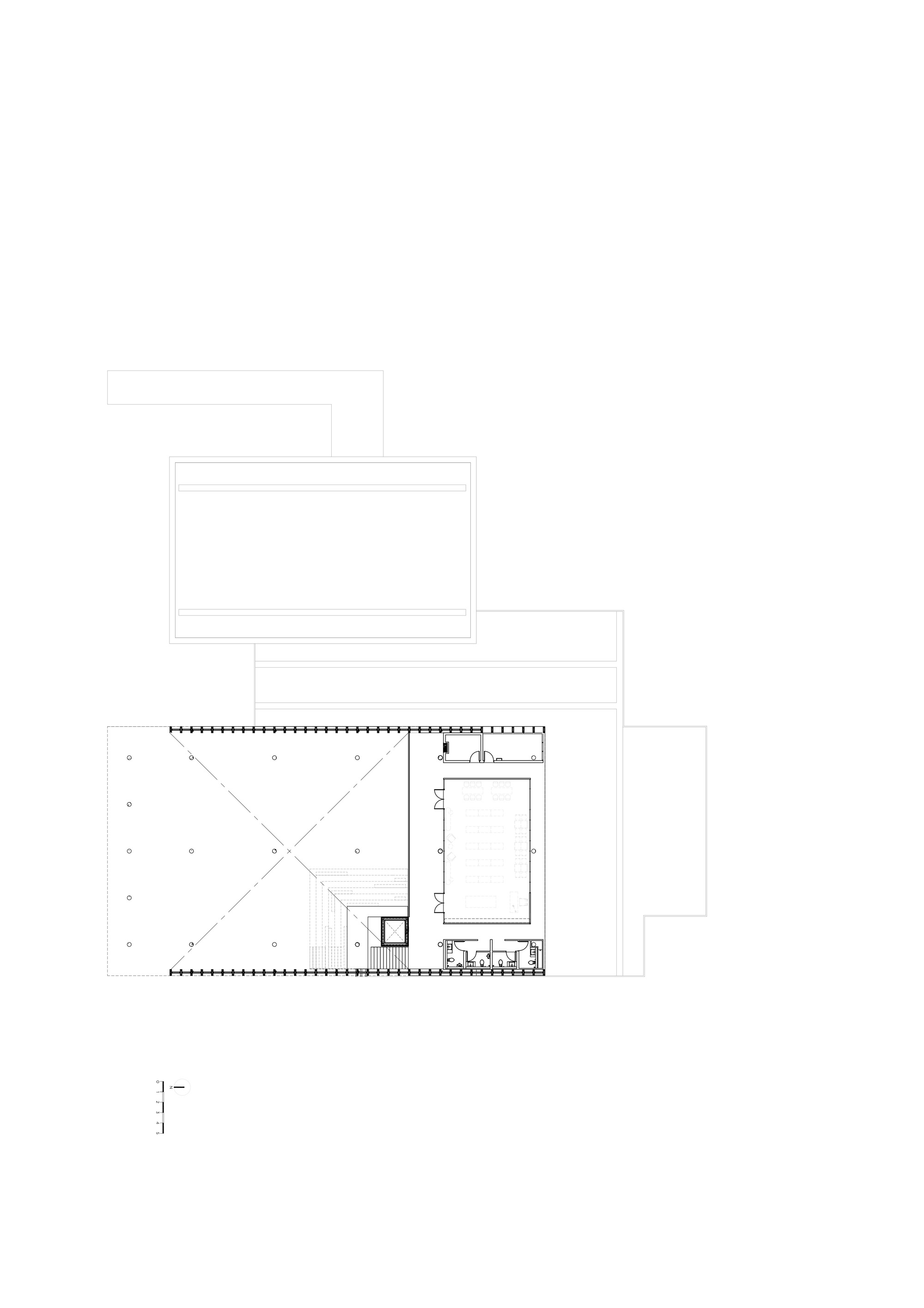 Floor plan drawing showing a main wing with diagonal circulation paths and a smaller rectangular annex