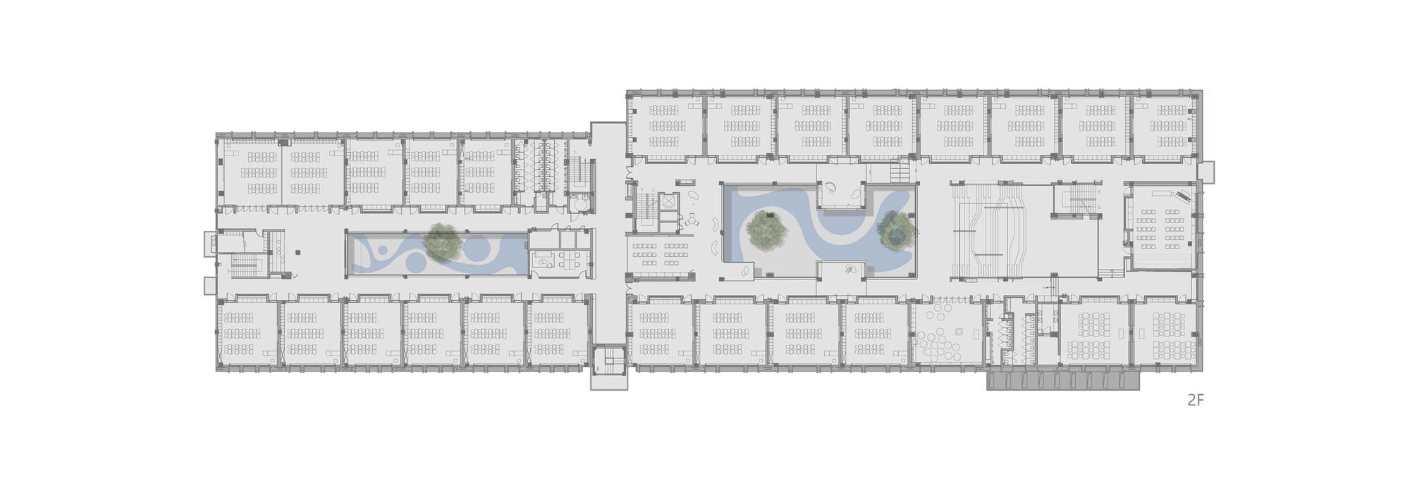 Floor plan drawing showing two parallel wings with interior courtyards and planted trees