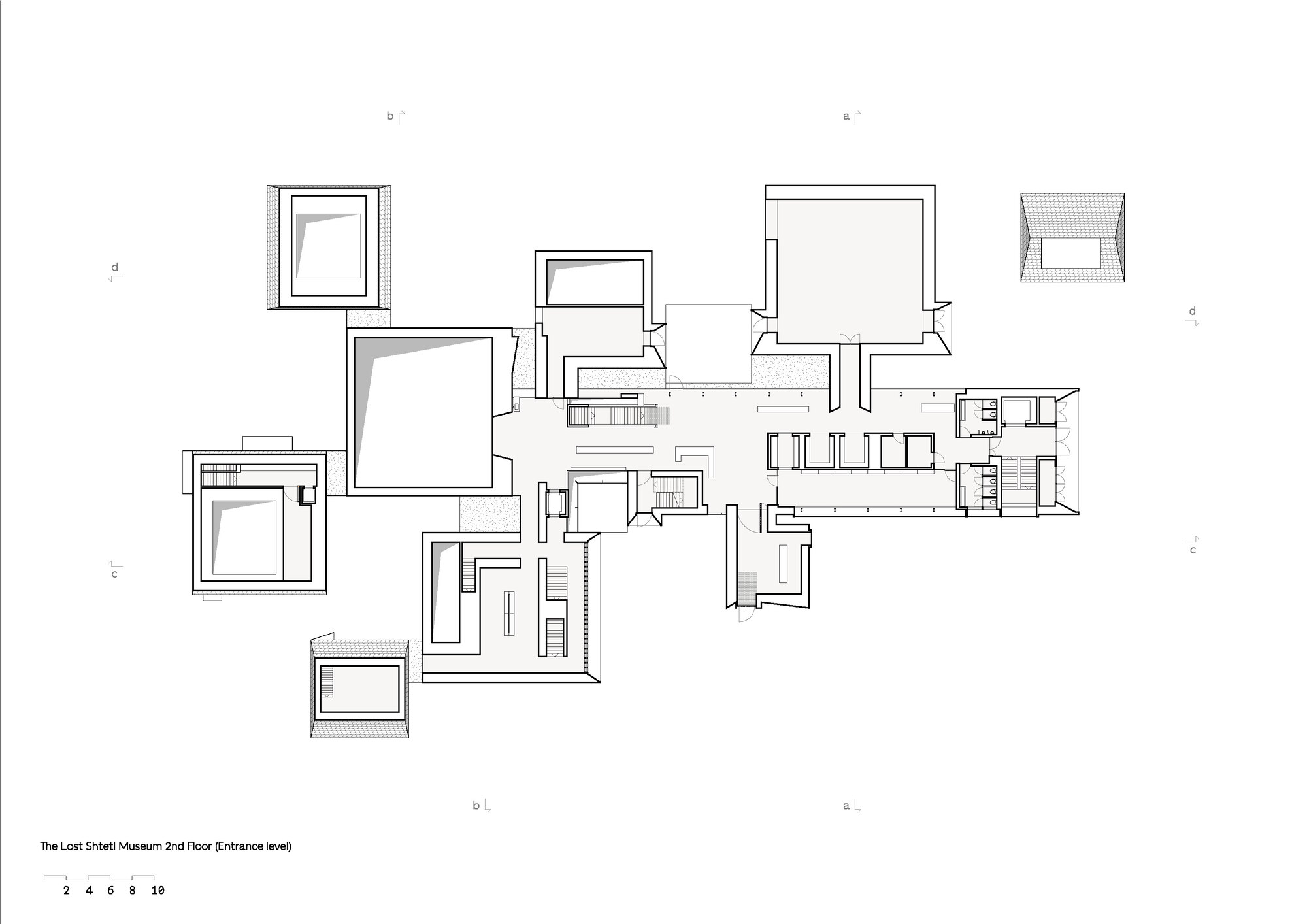 Floor plan drawing showing multiple pavilion volumes with stepped roof sections indicated