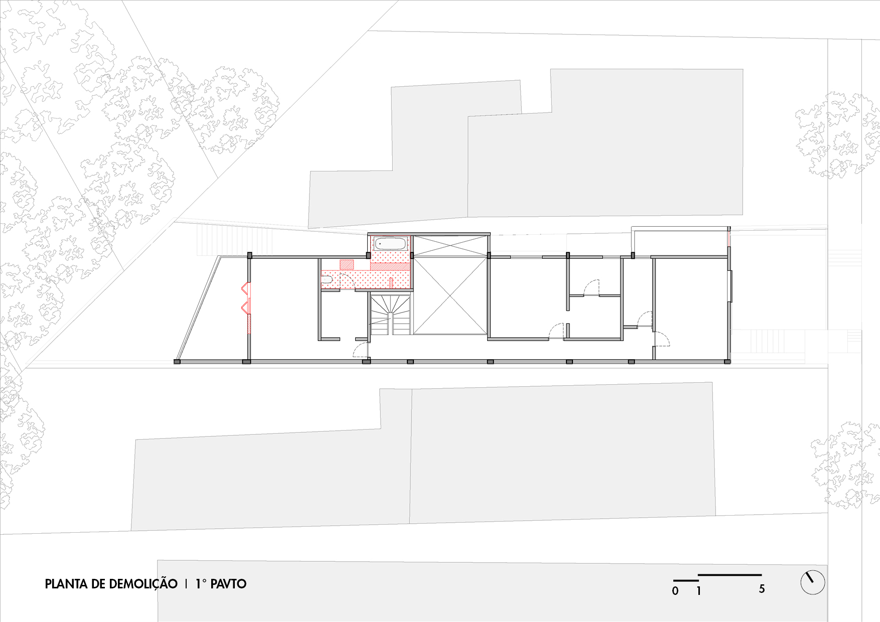 First floor demolition plan drawing showing existing walls and a central staircase with adjacent rooms