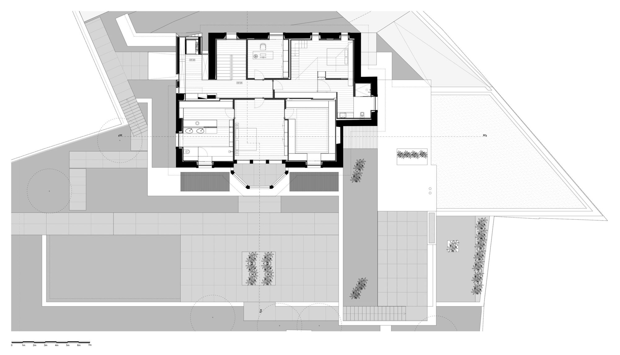 Floor plan drawing showing interior room layout with thick perimeter walls and central living spaces