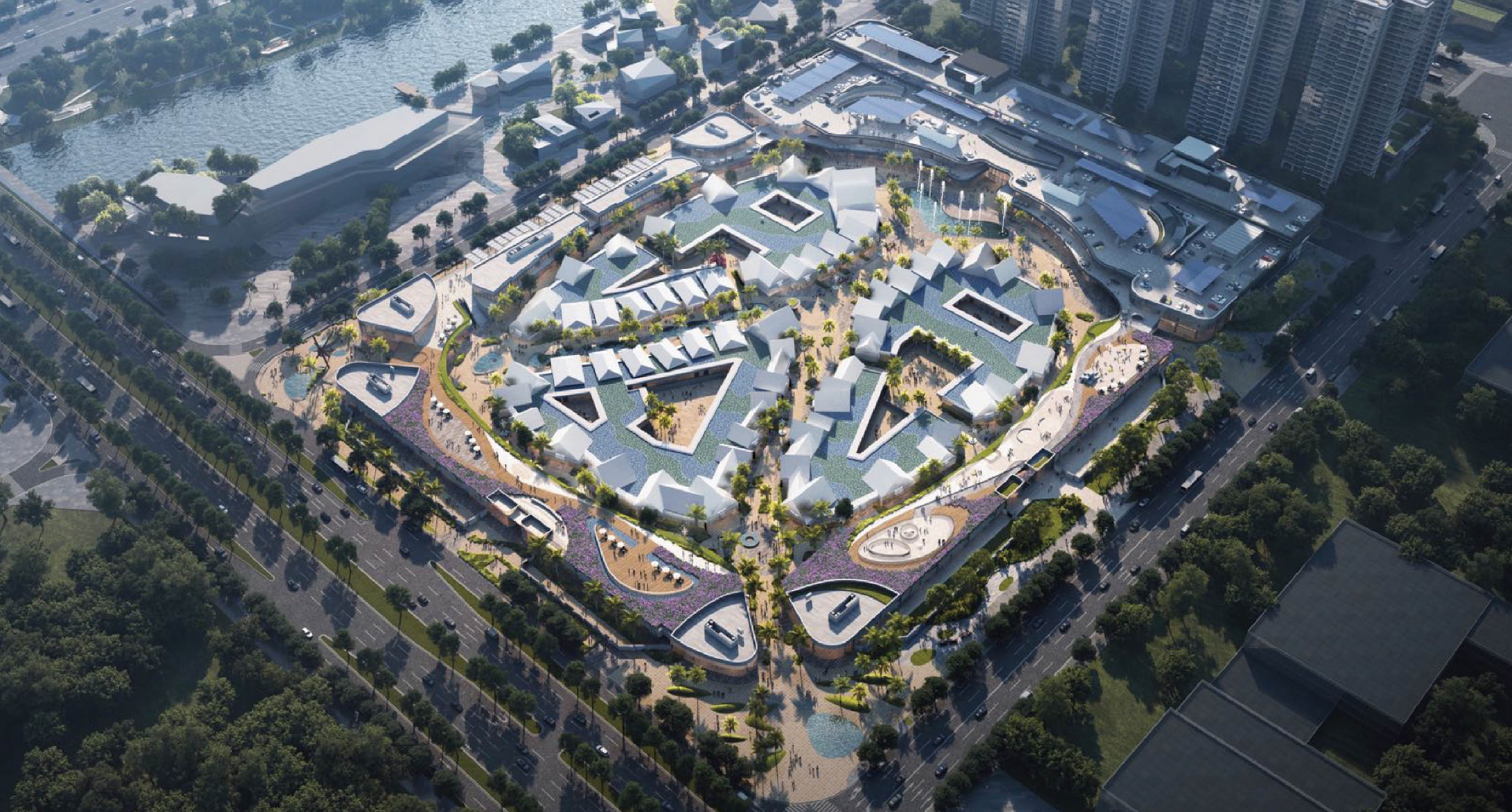 Aerial rendering of the courtyard complex with white roofs, landscaping, and surrounding urban blocks