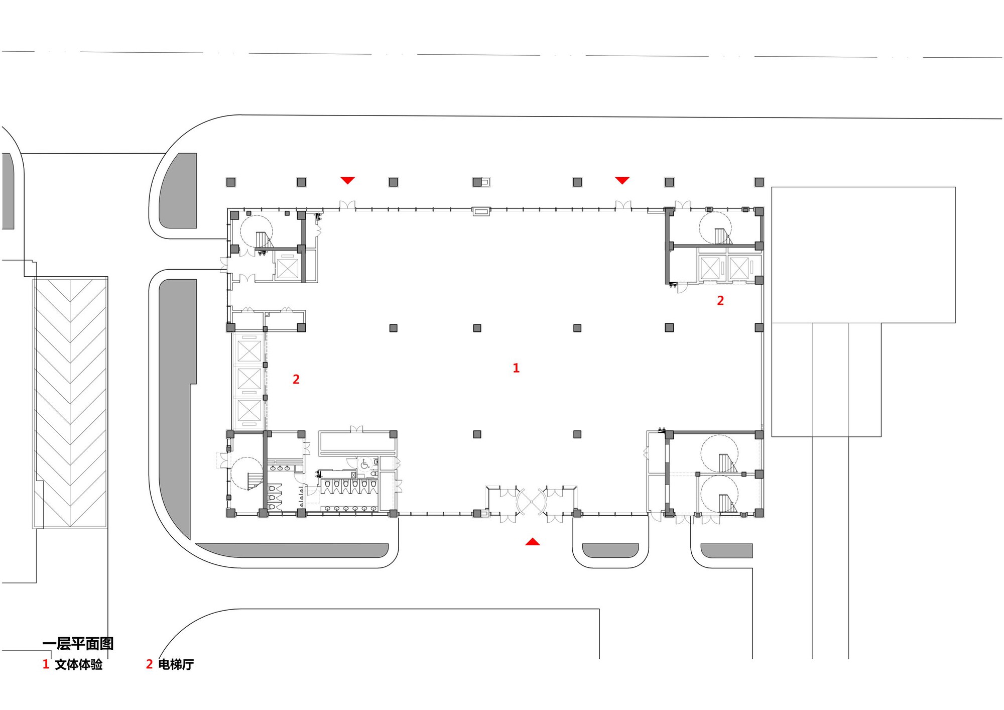 Ground floor plan drawing showing a large open hall flanked by service cores and staircases