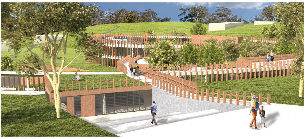 Curving pathways and green roofs merge architecture with the terrain, creating a seamless transition into the conservation center.