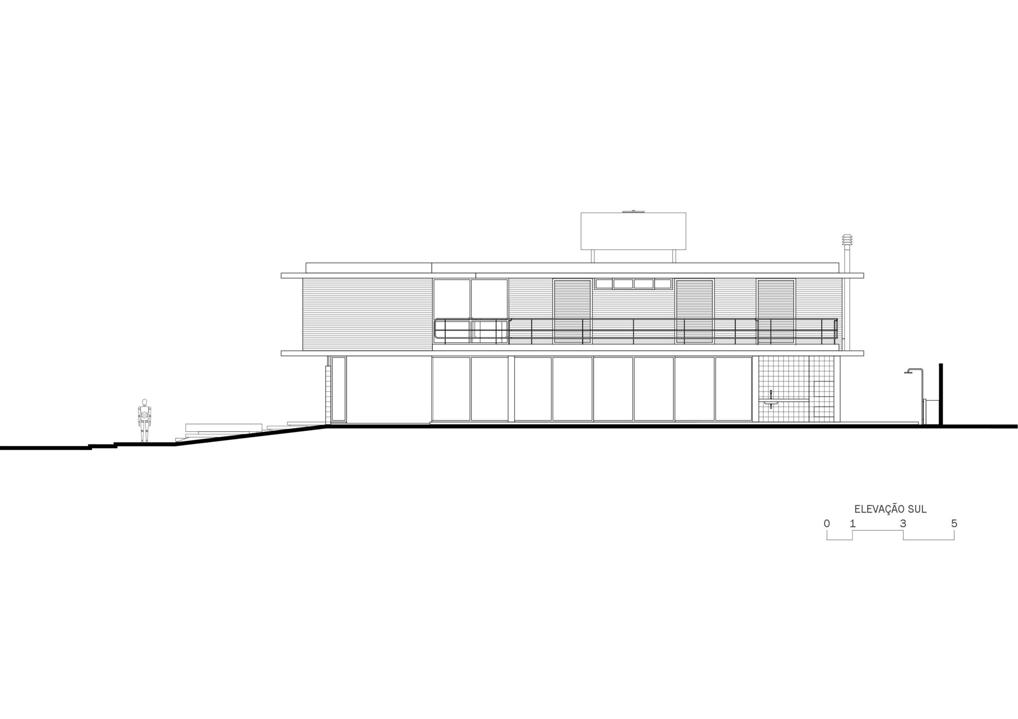 South elevation drawing depicting a horizontal two-story structure on sloping terrain with a rooftop element
