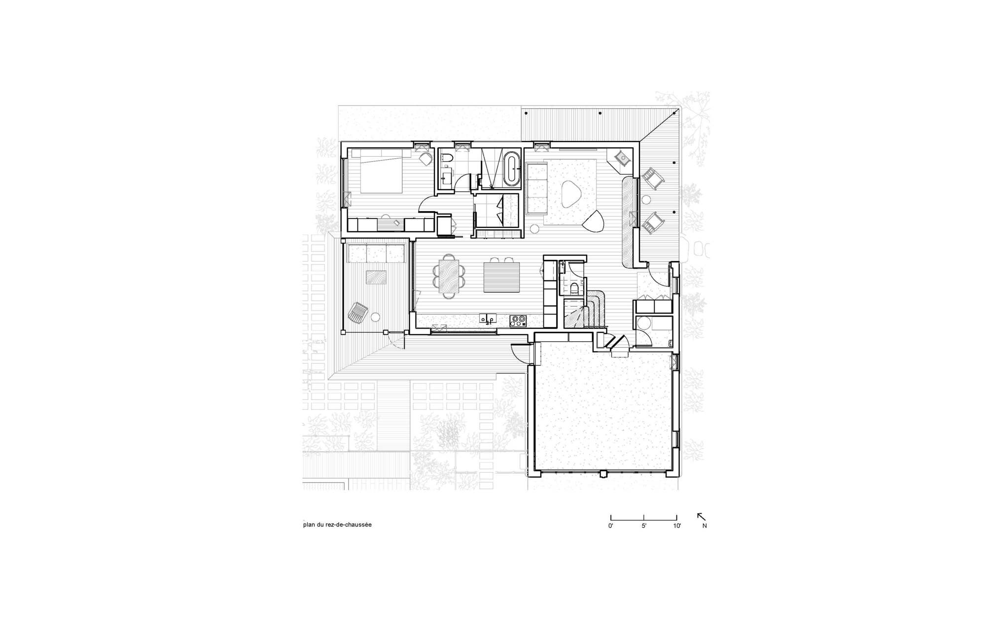 Ground floor plan drawing showing room layouts with living, kitchen, bedrooms and deck with surrounding landscape