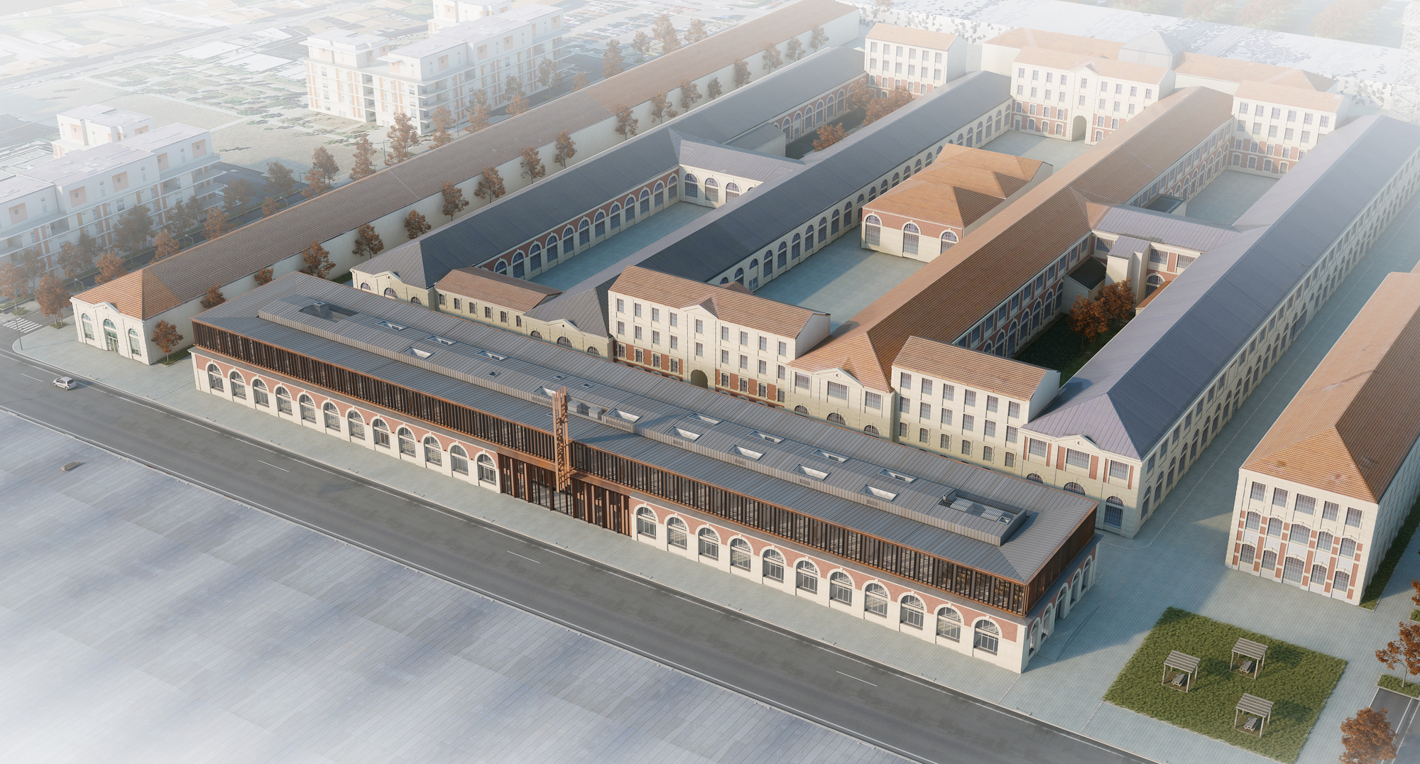 Aerial rendering of a renovated industrial complex with courtyards and arched brick facades