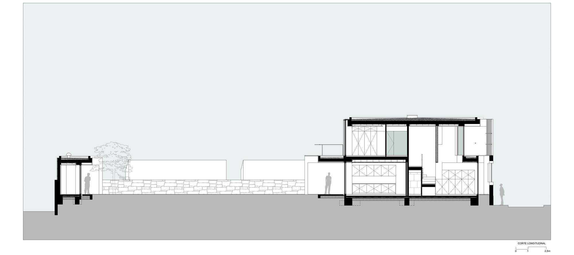 Longitudinal section drawing revealing interior spatial divisions and circulation between split-level volumes
