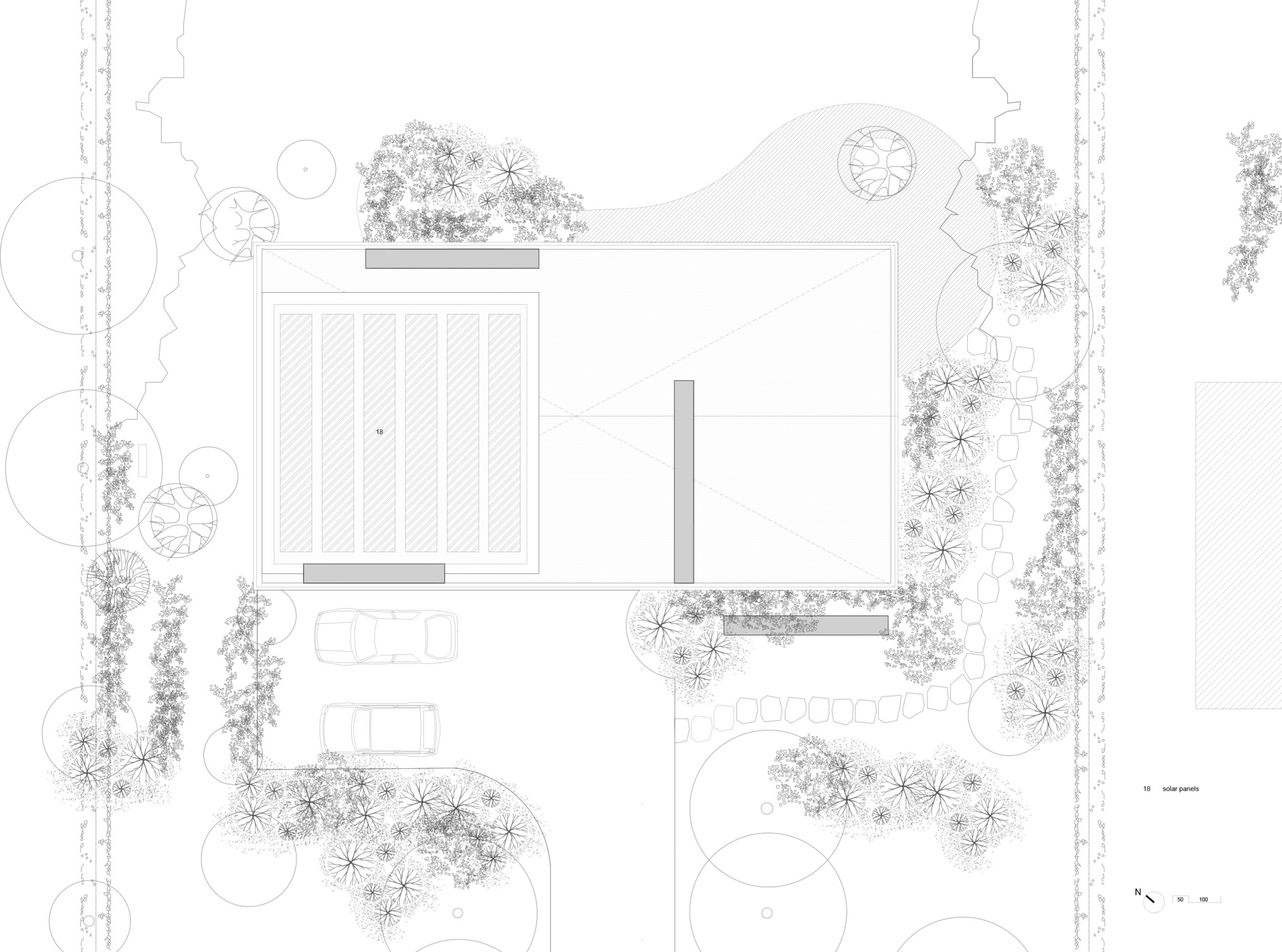 Site plan drawing with curved roof form surrounded by landscaped garden beds and mature trees