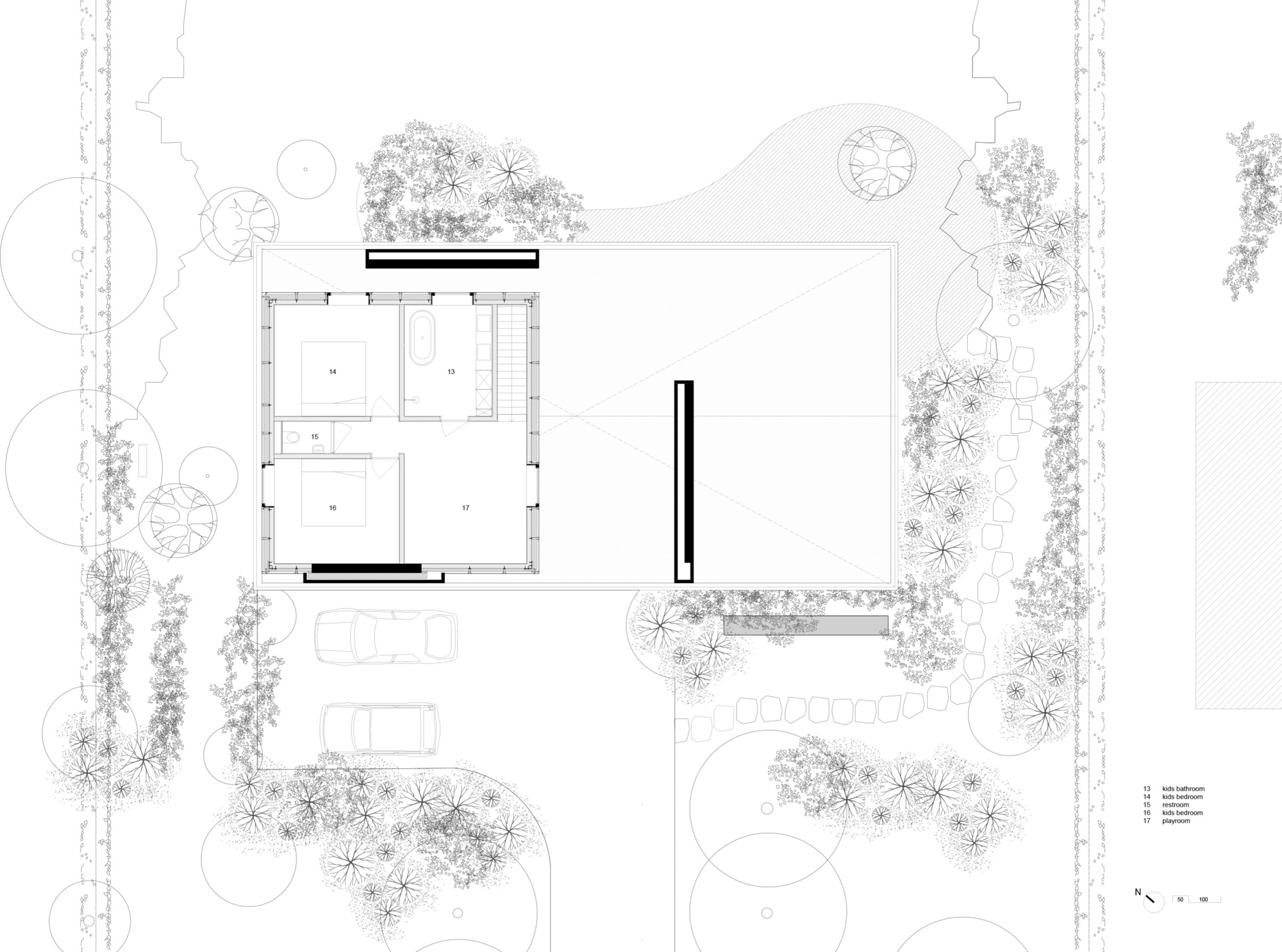 First floor plan drawing indicating bedroom layout and bathroom zones within overall building envelope