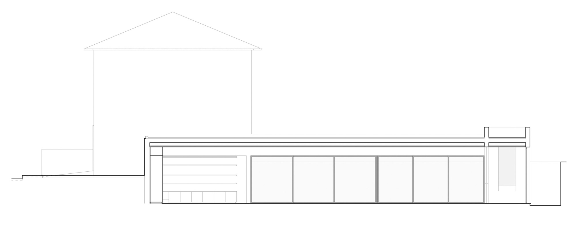 Elevation drawing showing a low horizontal wing with glazed openings beside a pitched roof structure