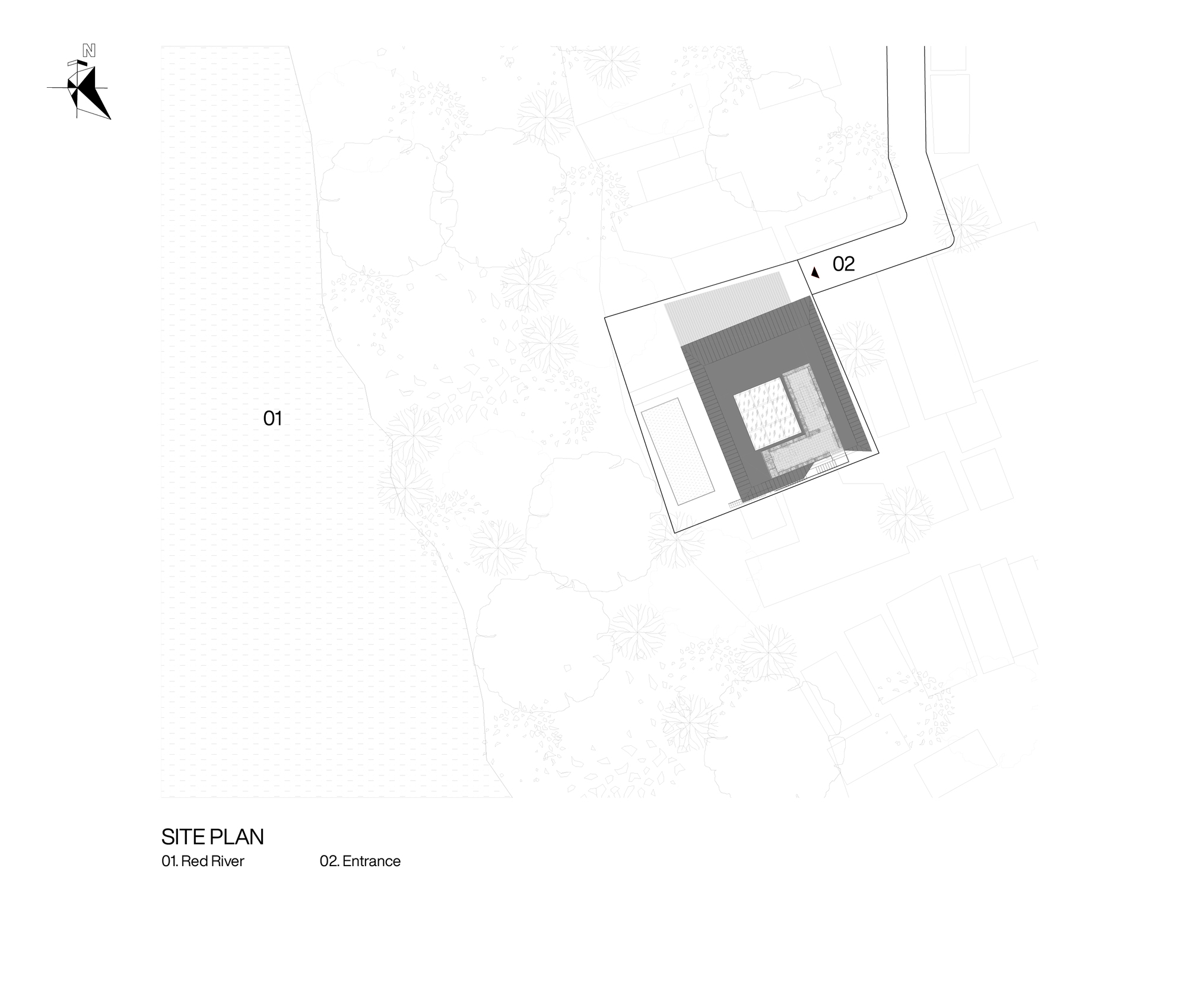 Site plan drawing showing the building footprint positioned near a curved waterway and entry drive