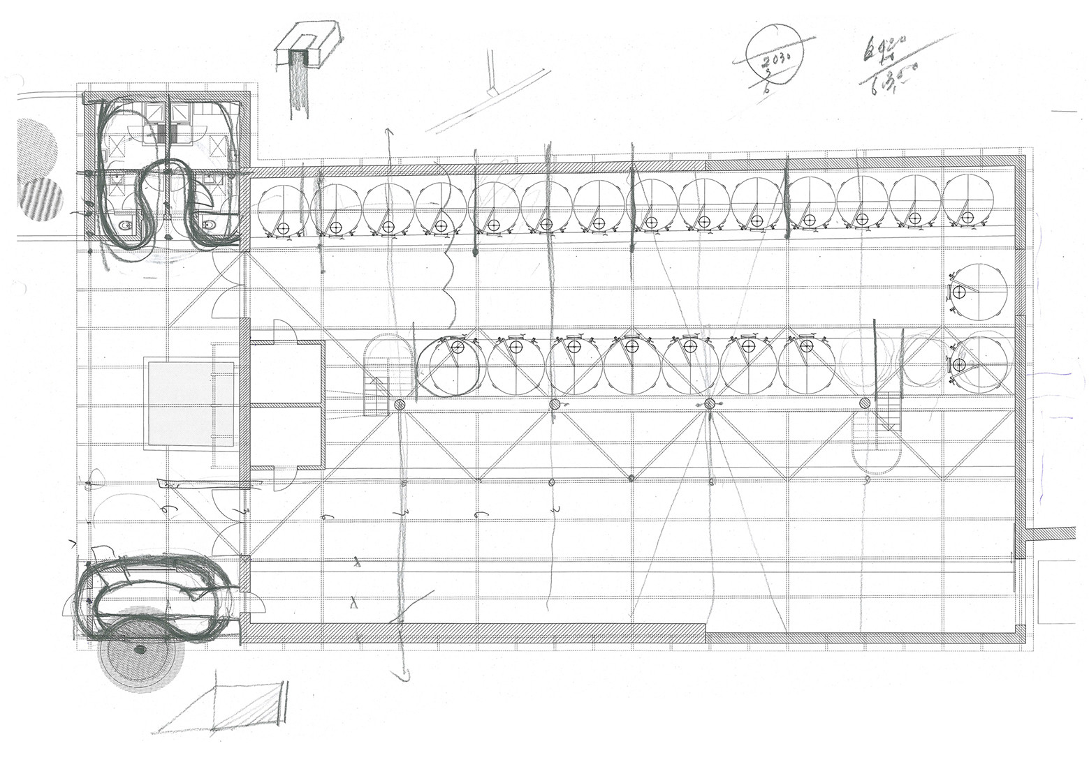 Floor plan drawing showing a rectangular hall with parallel rows of circular tanks and diagonal bracing