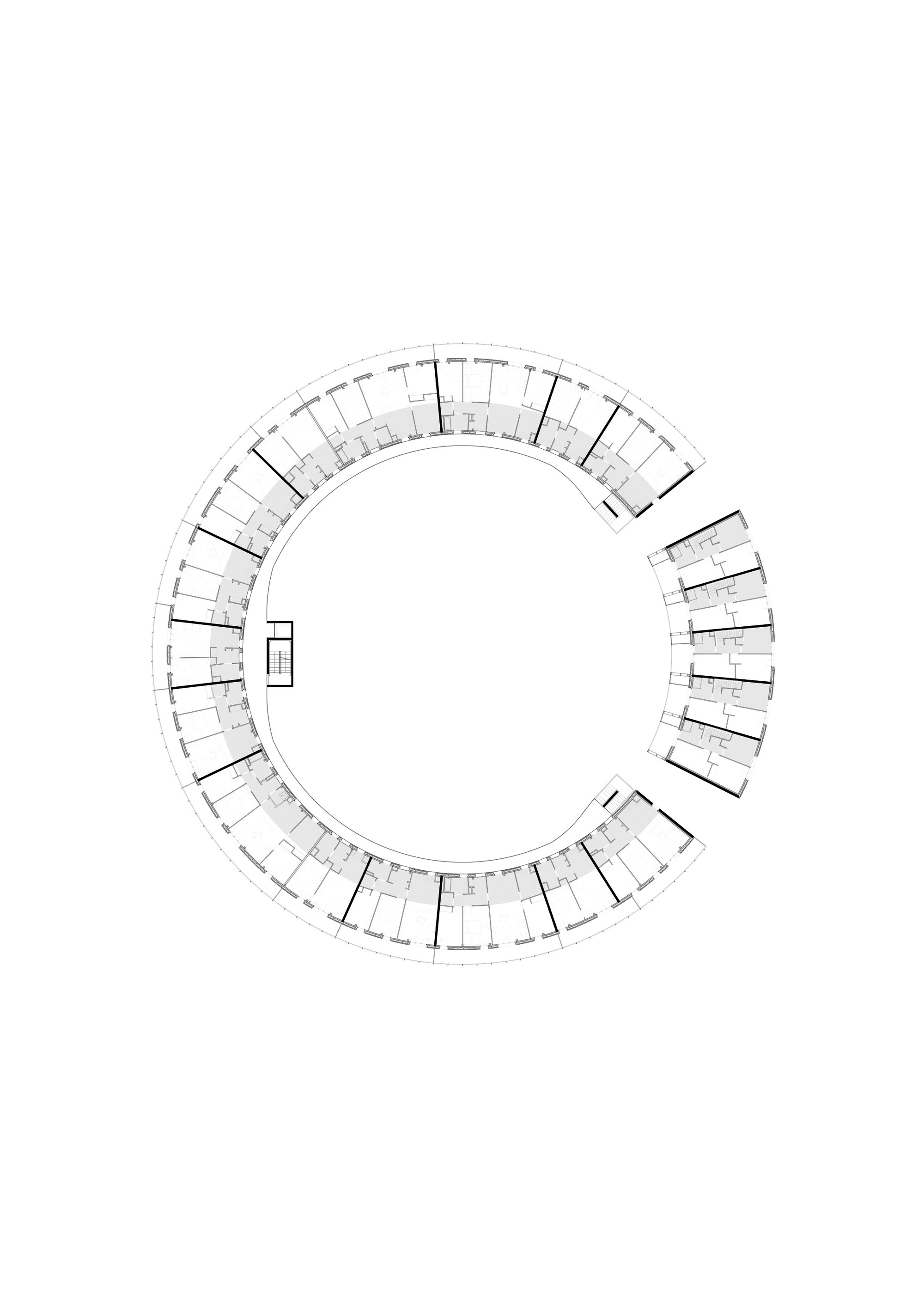 Floor plan drawing showing a circular residential tower with radial apartment units around a central core