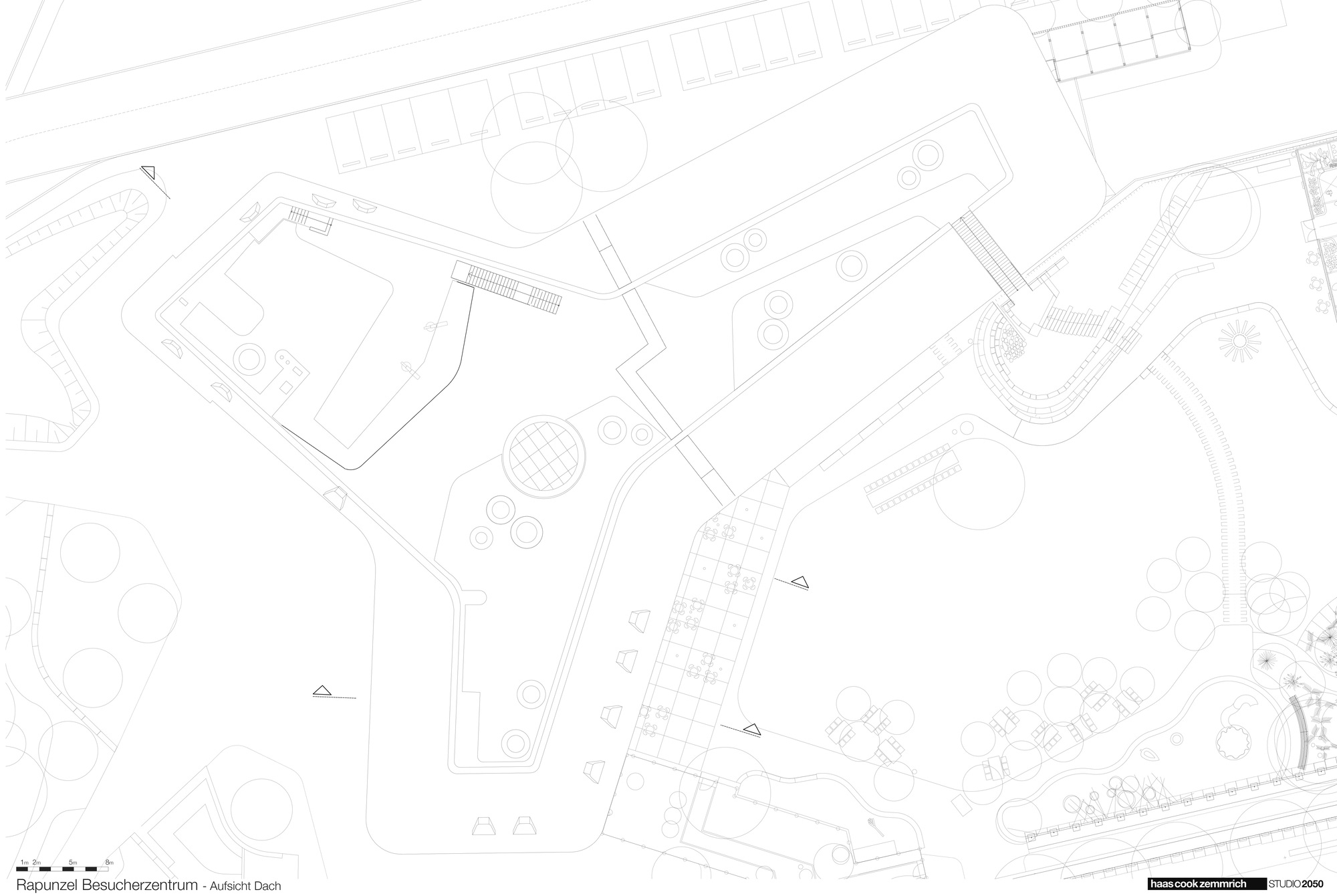 Site plan drawing showing the Y-shaped building within its surrounding context and street network
