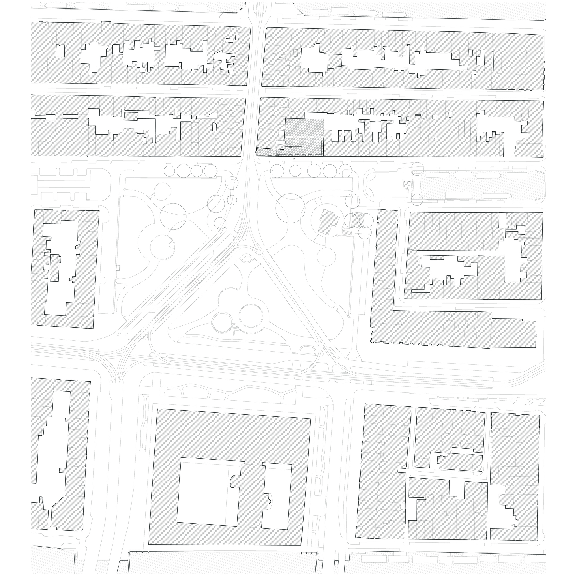 Site plan drawing showing the building footprint within surrounding urban blocks and intersecting streets