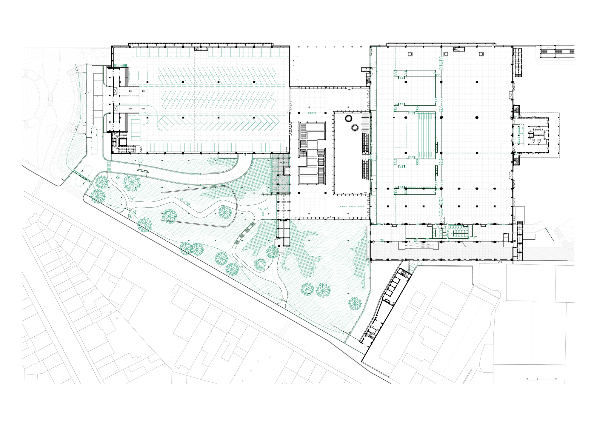 Site plan drawing showing the triangular complex with landscaped garden areas and adjacent street grid