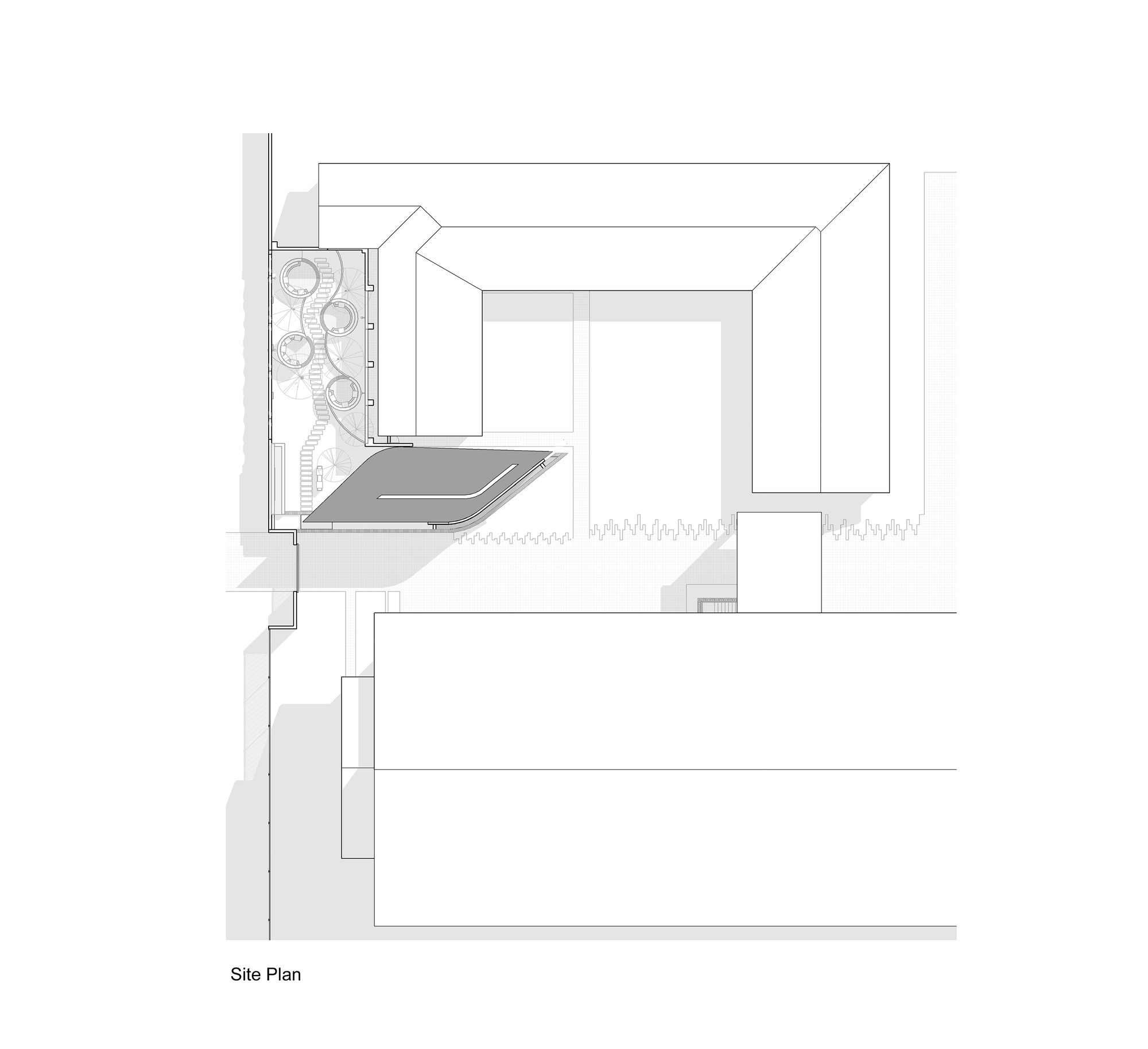 Site plan drawing showing building footprint with courtyard and adjacent structures