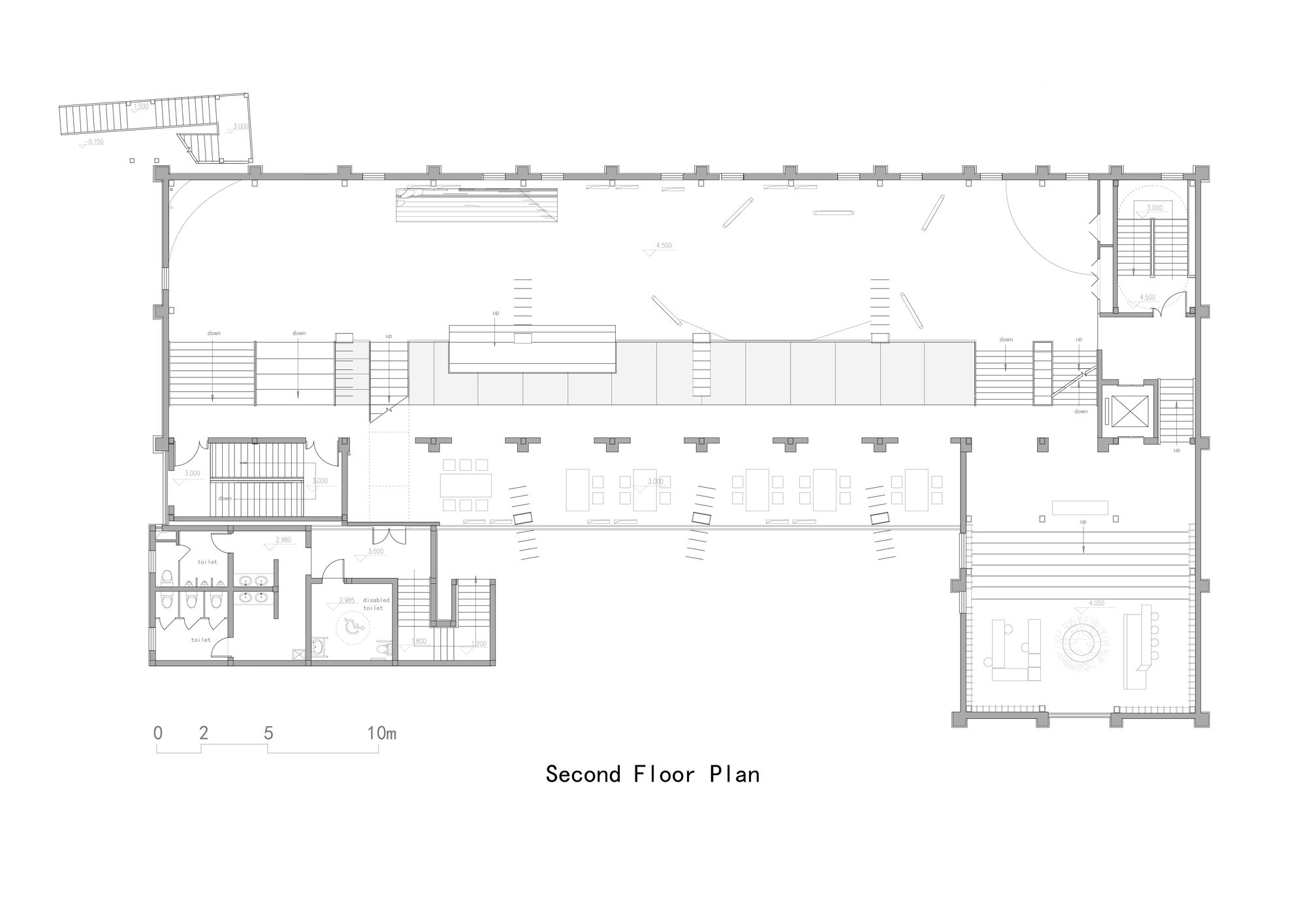 Second floor plan drawing depicting a long rectangular space with central service core and corner stair towers