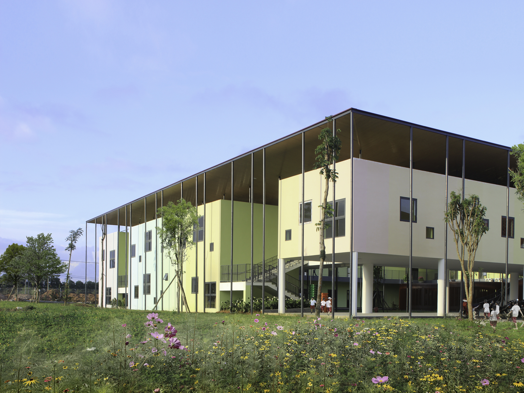 Side elevation showing thin canopy over colored panels with wildflowers in foreground