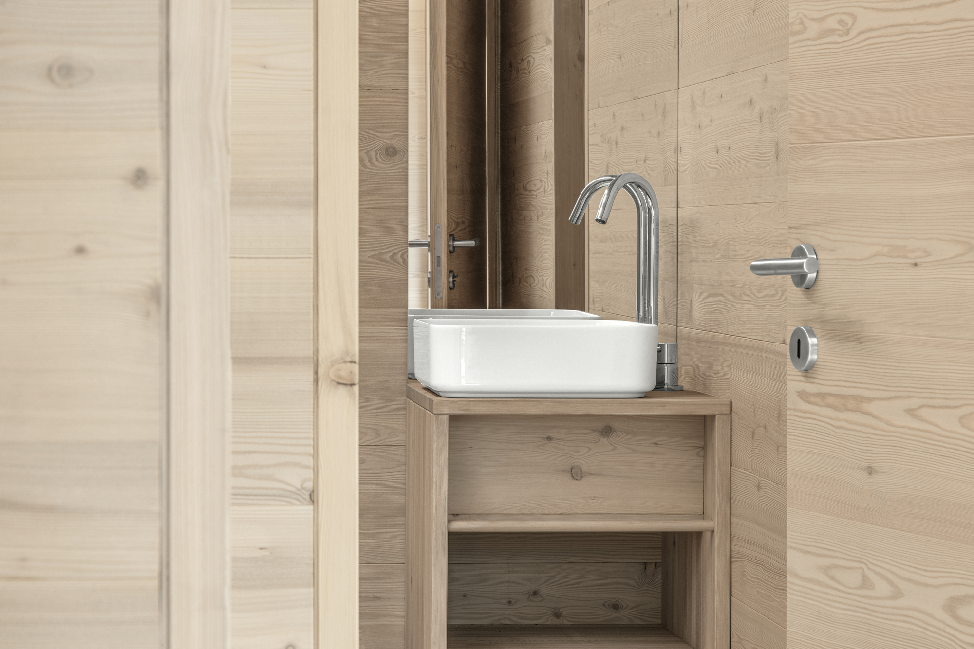Bathroom vanity with white vessel sink and chrome fixtures against timber plank walls