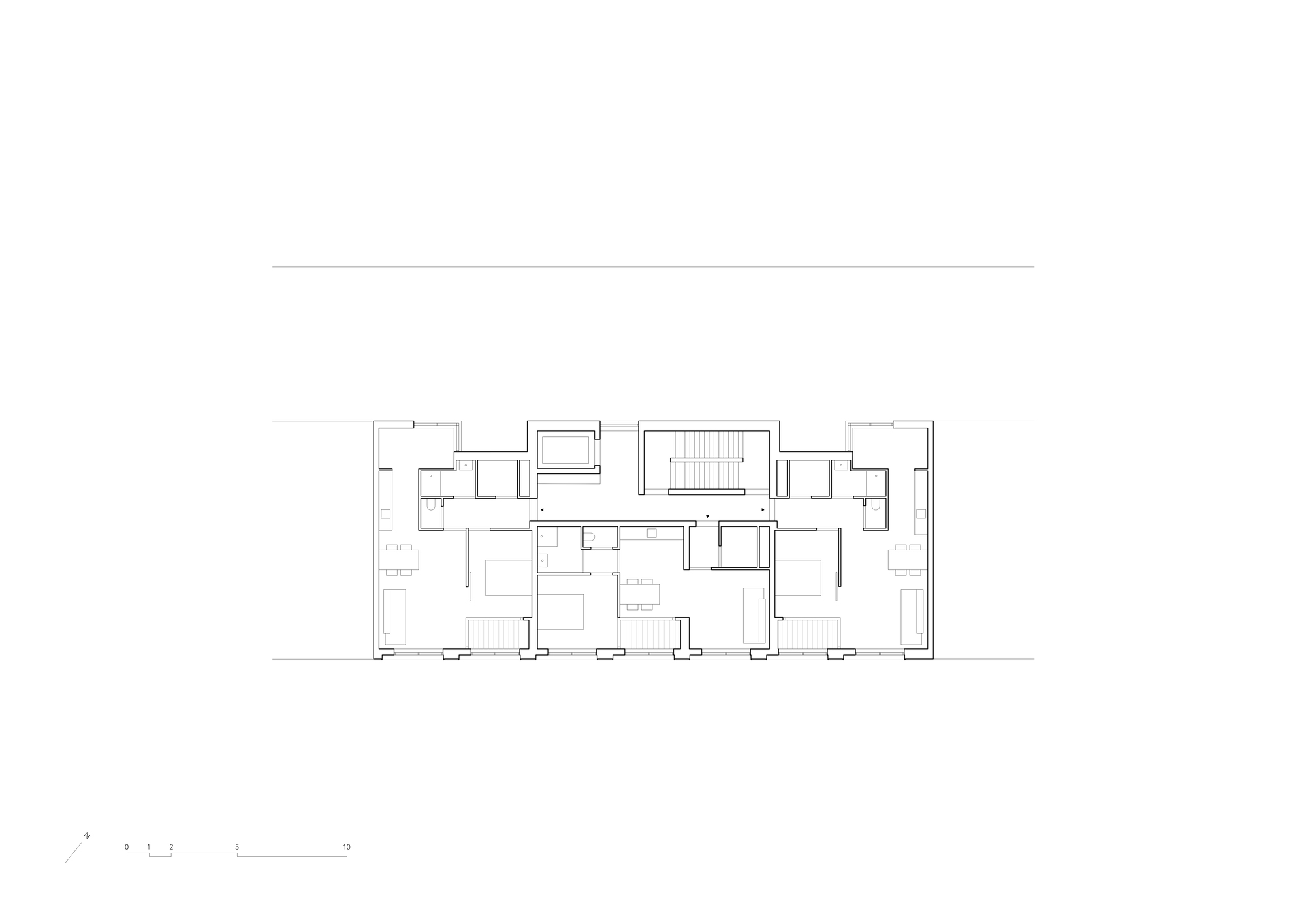 Upper floor plan drawing with symmetrical residential units flanking a central stair core
