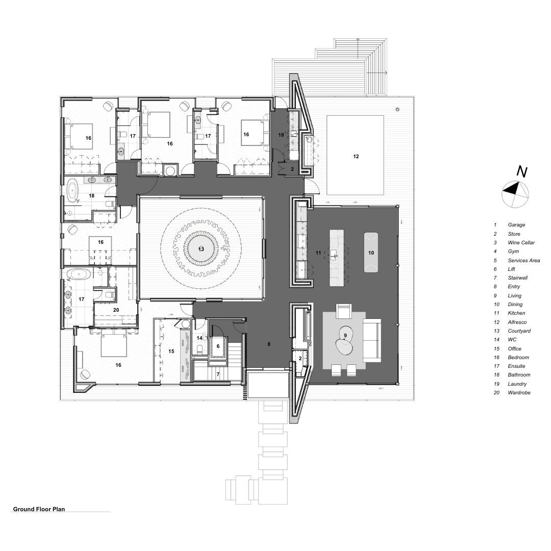 Ground floor plan drawing showing living areas surrounding a circular courtyard with concentric paving rings