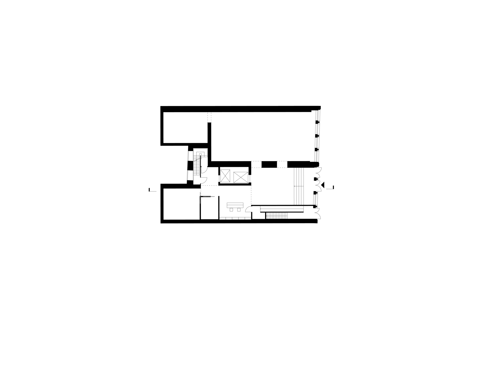 Floor plan drawing showing an open layout with a central stair and terrace on the right