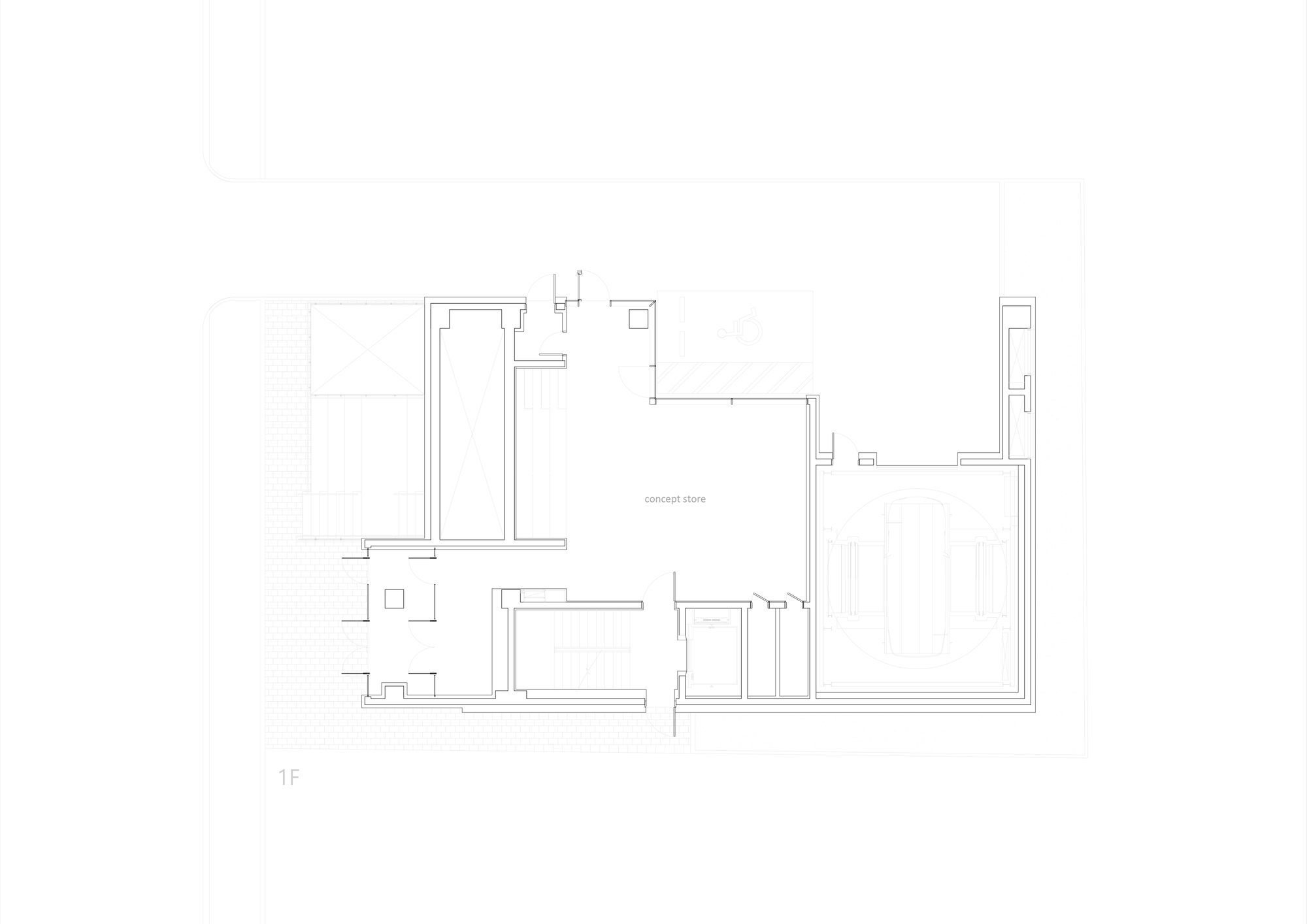 First floor plan drawing showing rooms arranged around a central space with stair and service cores
