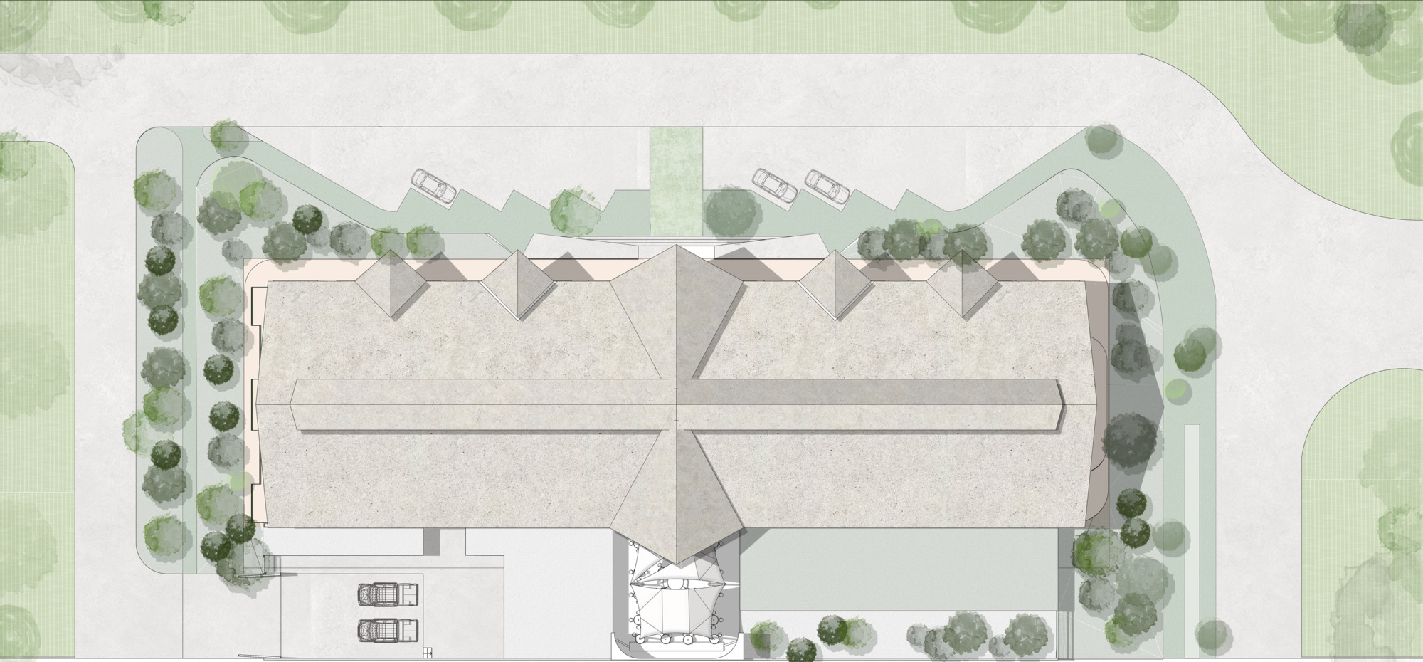 Site plan drawing showing a rectangular building with sawtooth roofline surrounded by trees and parking