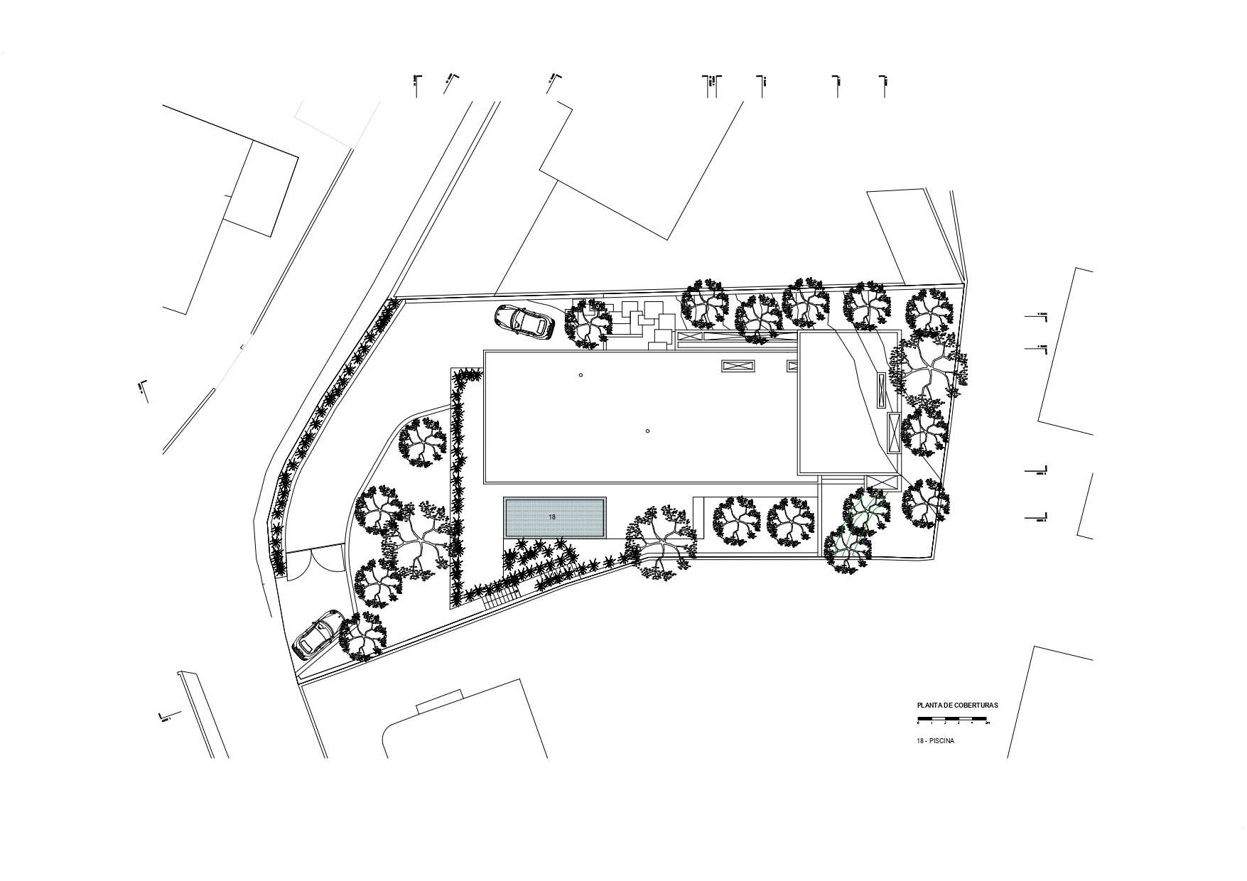 Site plan drawing illustrating the building layout with pool, trees, and vehicular access