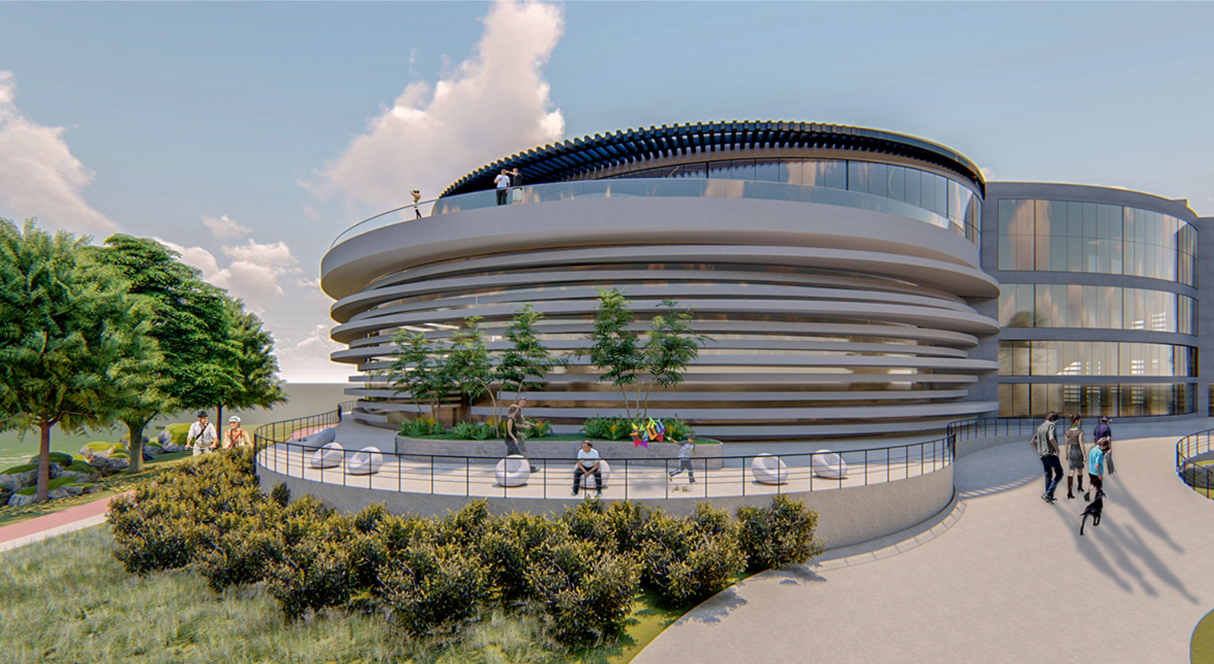 Circular building with horizontal banded facade and rooftop terrace surrounded by landscaped pathways under afternoon clouds