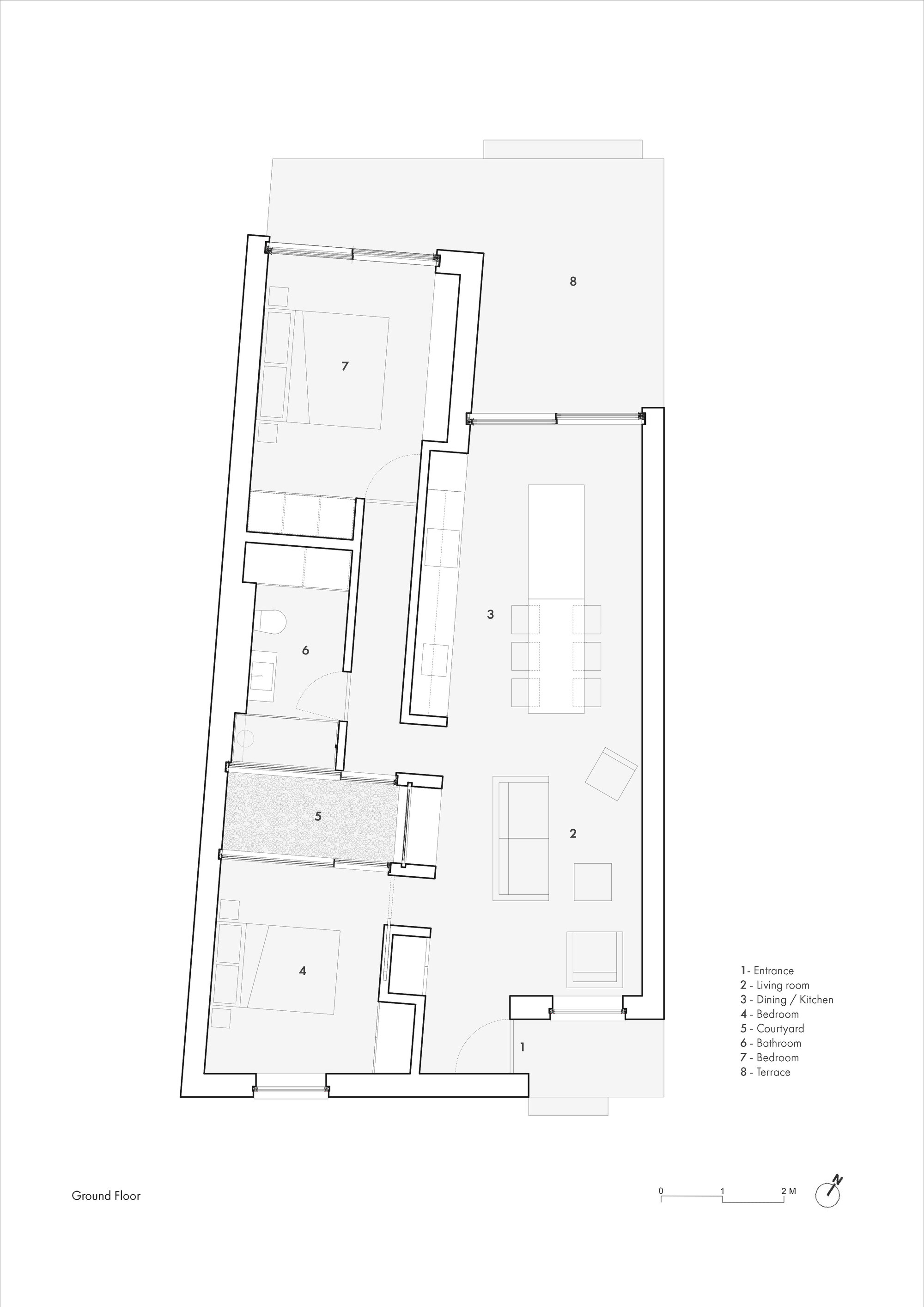 Ground floor plan drawing showing entrance, living room, kitchen, bedroom, and courtyard spaces