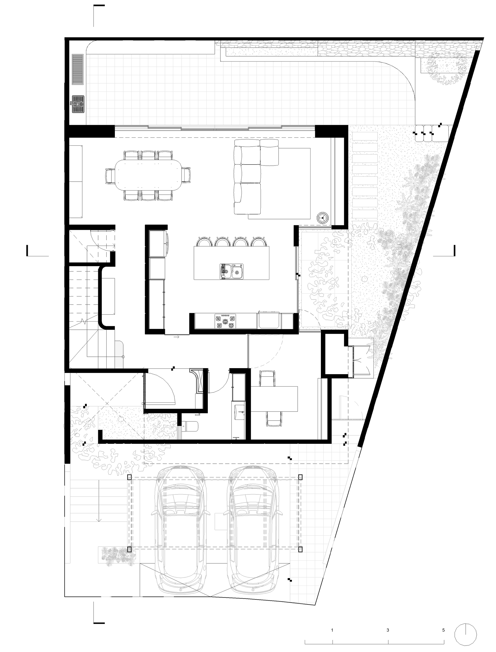 Ground floor plan showing open living and dining areas with a two-car garage