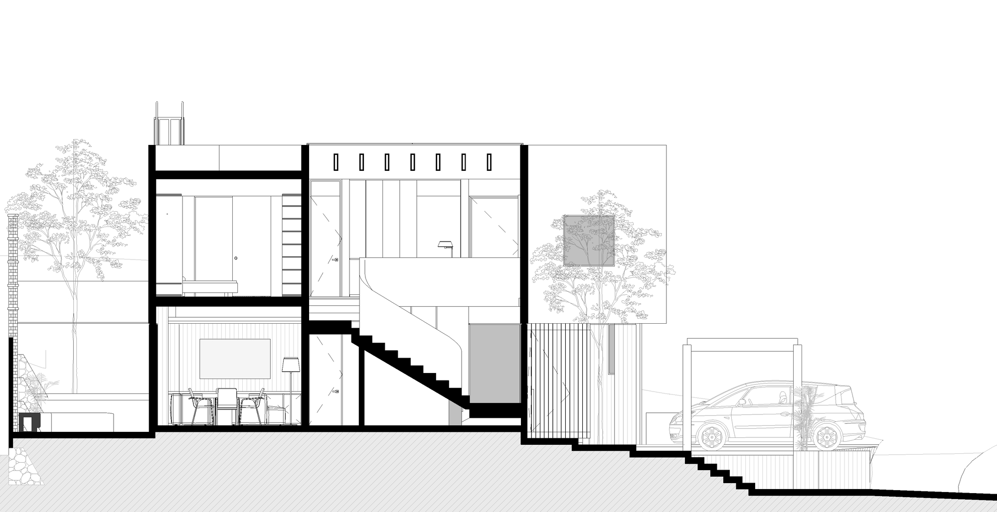 Section drawing showing the split-level interior with staircase connecting living spaces and garage